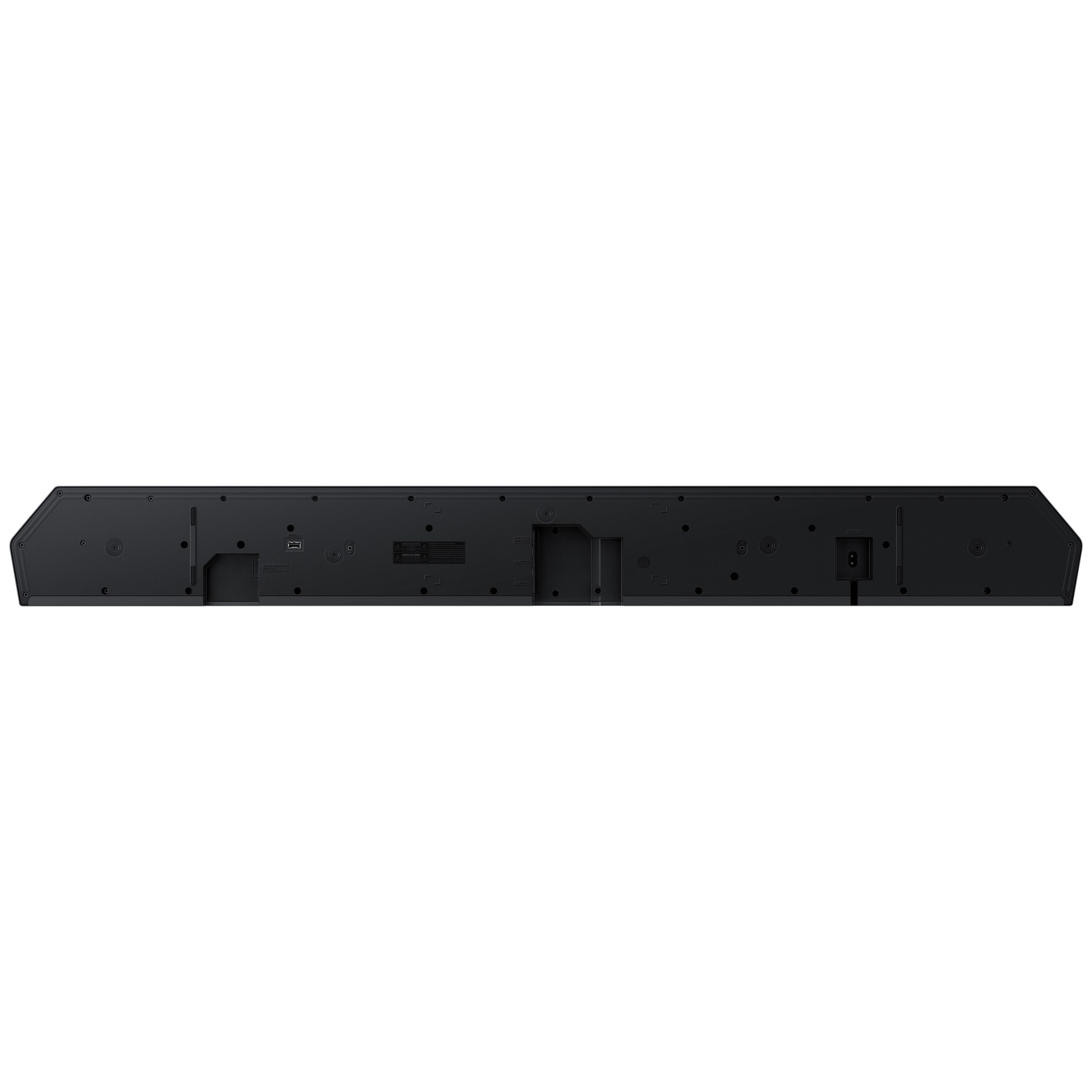 Arrière d'une barre de son noire montrant les ports USB et d'alimentation.