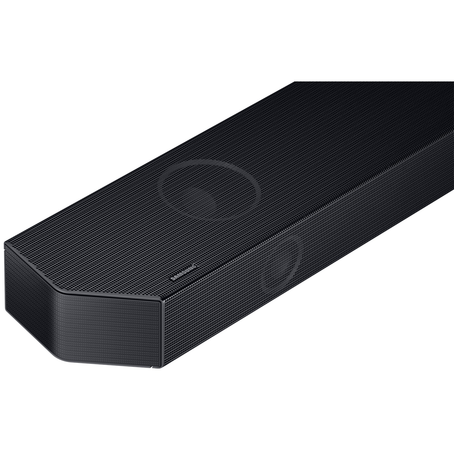 Barre de son Samsung noire avec grille et logo de haut-parleur visibles.