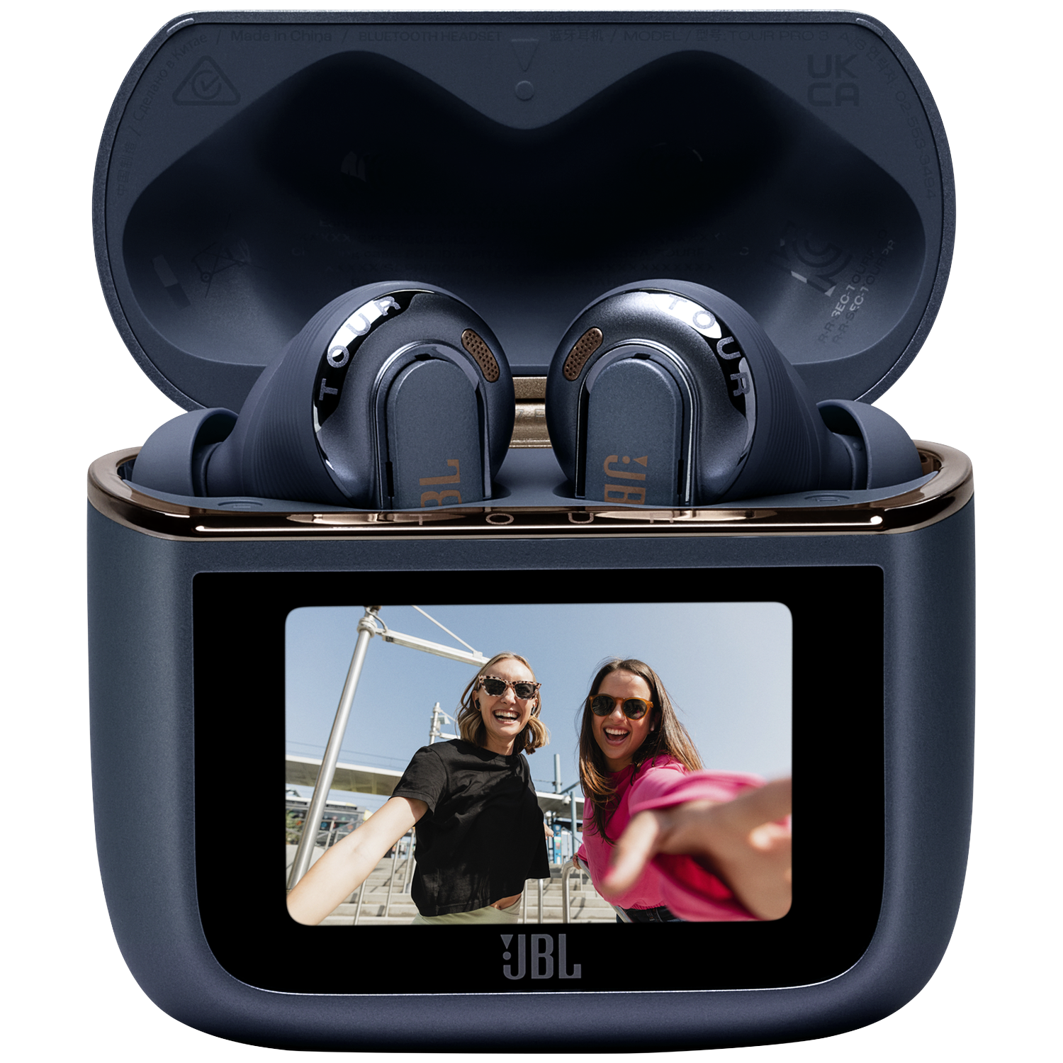 Dark blue earbuds with charging case, screen shows two women taking a selfie.