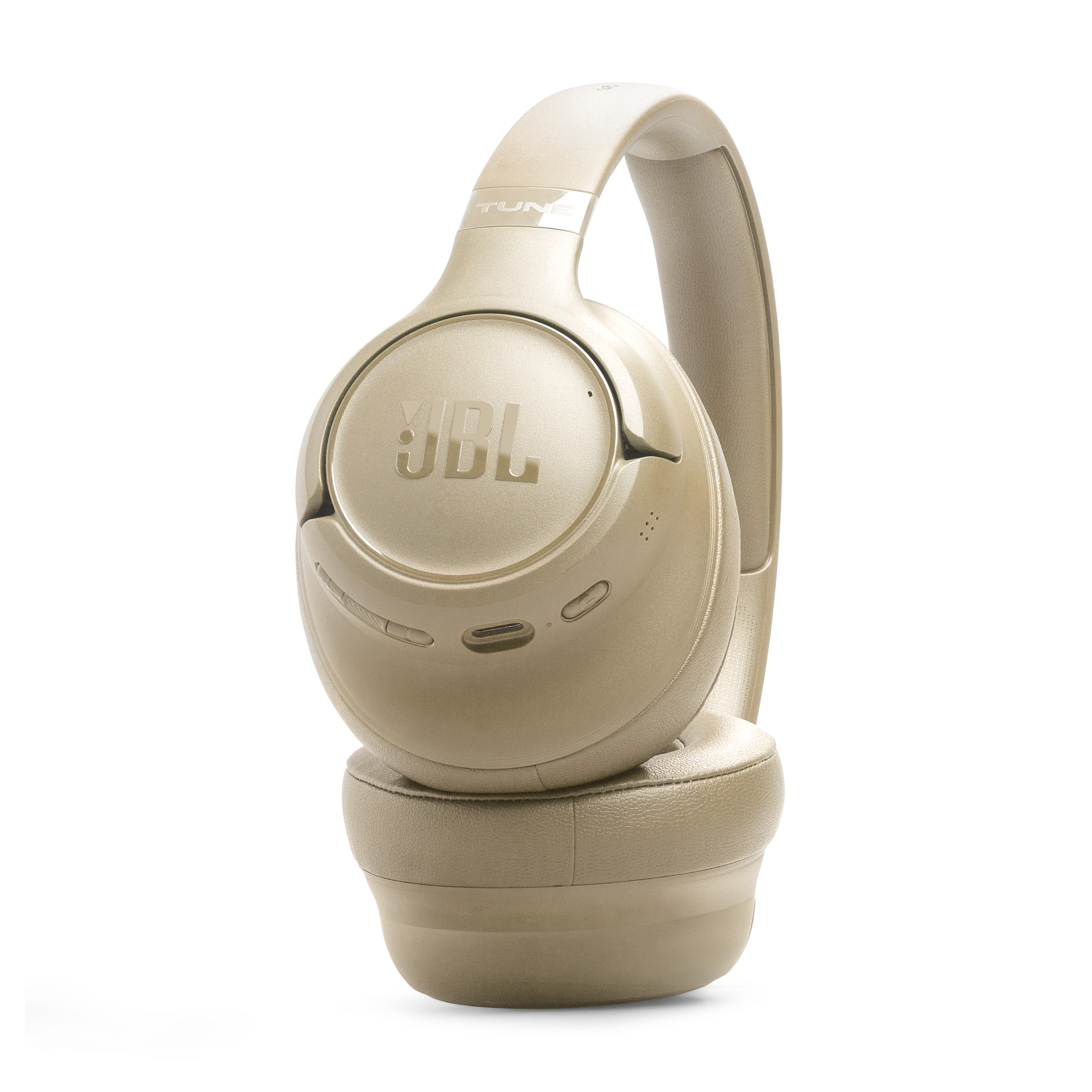 Goldene JBL-Kopfhörer mit Ohrpolstern und verstellbarem Kopfbügel.