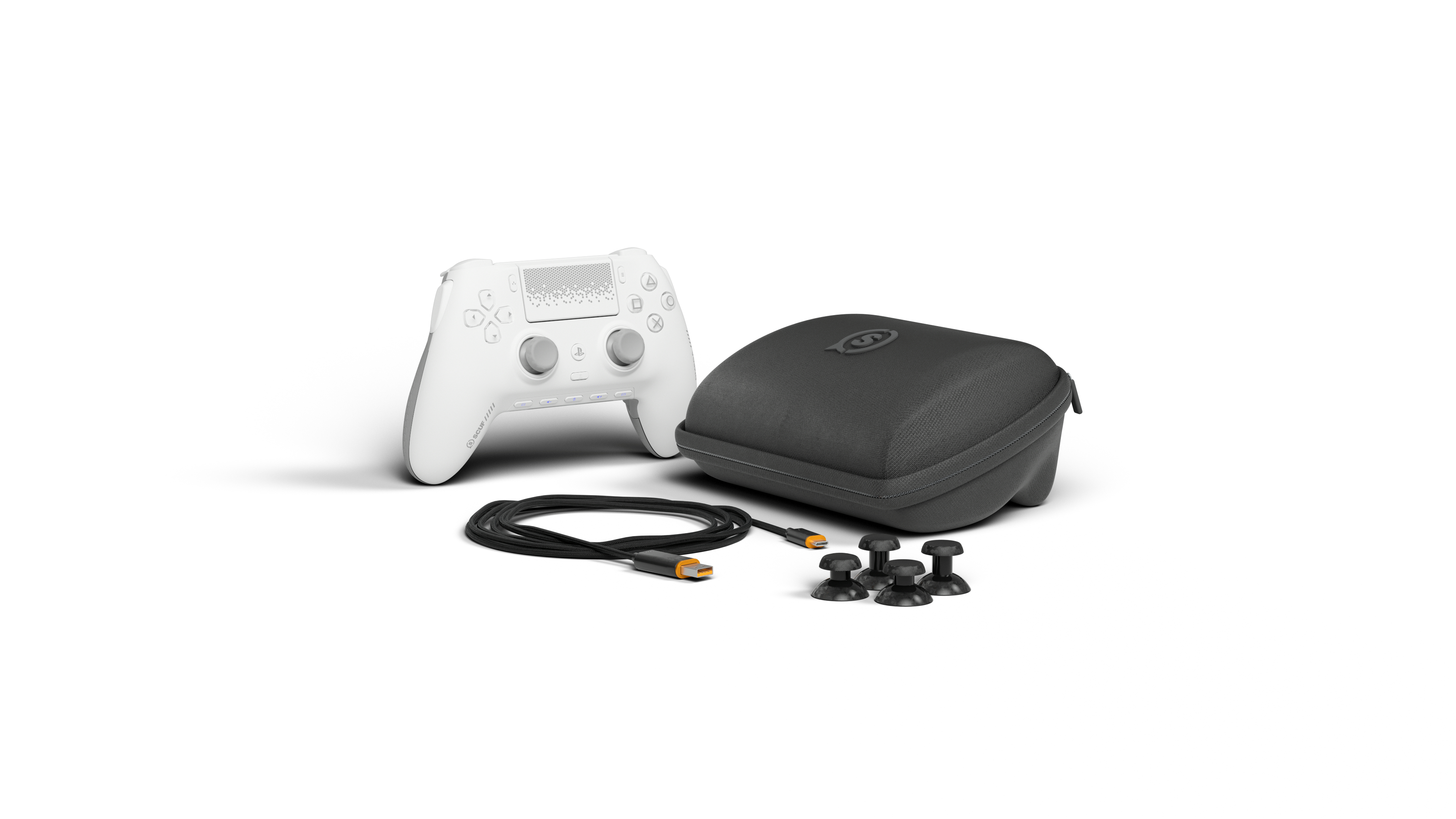 Ein weißer Controller mit Zubehör: schwarzes Kabel, graue Kappe und schwarze Stickkappen.