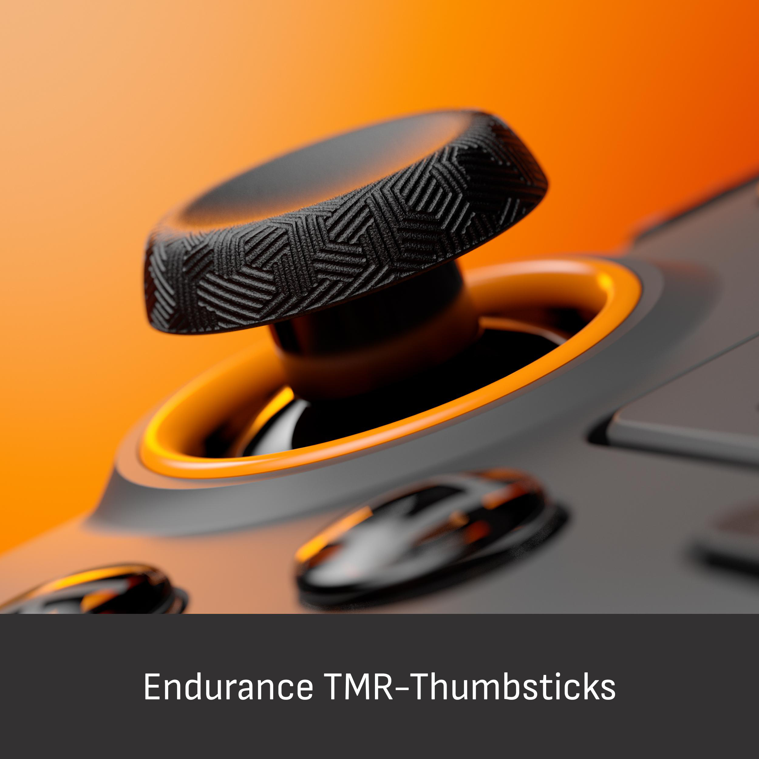Nahaufnahme eines schwarzen Controller-Daumensticks mit Muster auf orangefarbenem Hintergrund.