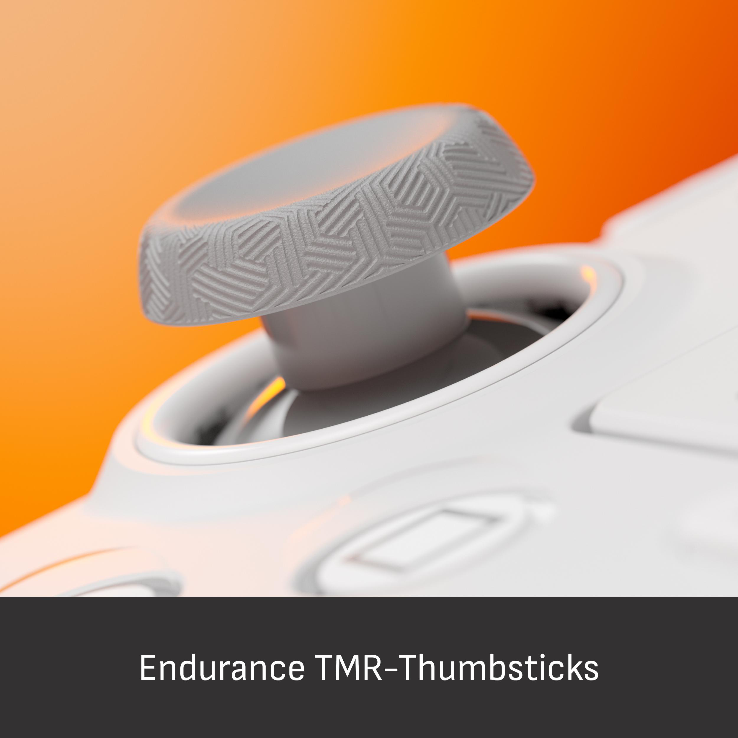 Grauer Controller-Daumenstick mit Muster, orangefarbener Hintergrund.