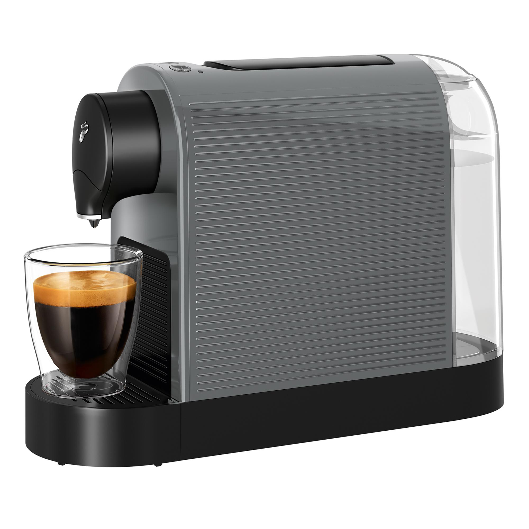 Graue Kaffeemaschine mit Glas und Kaffee, mit transparentem Wassertank.