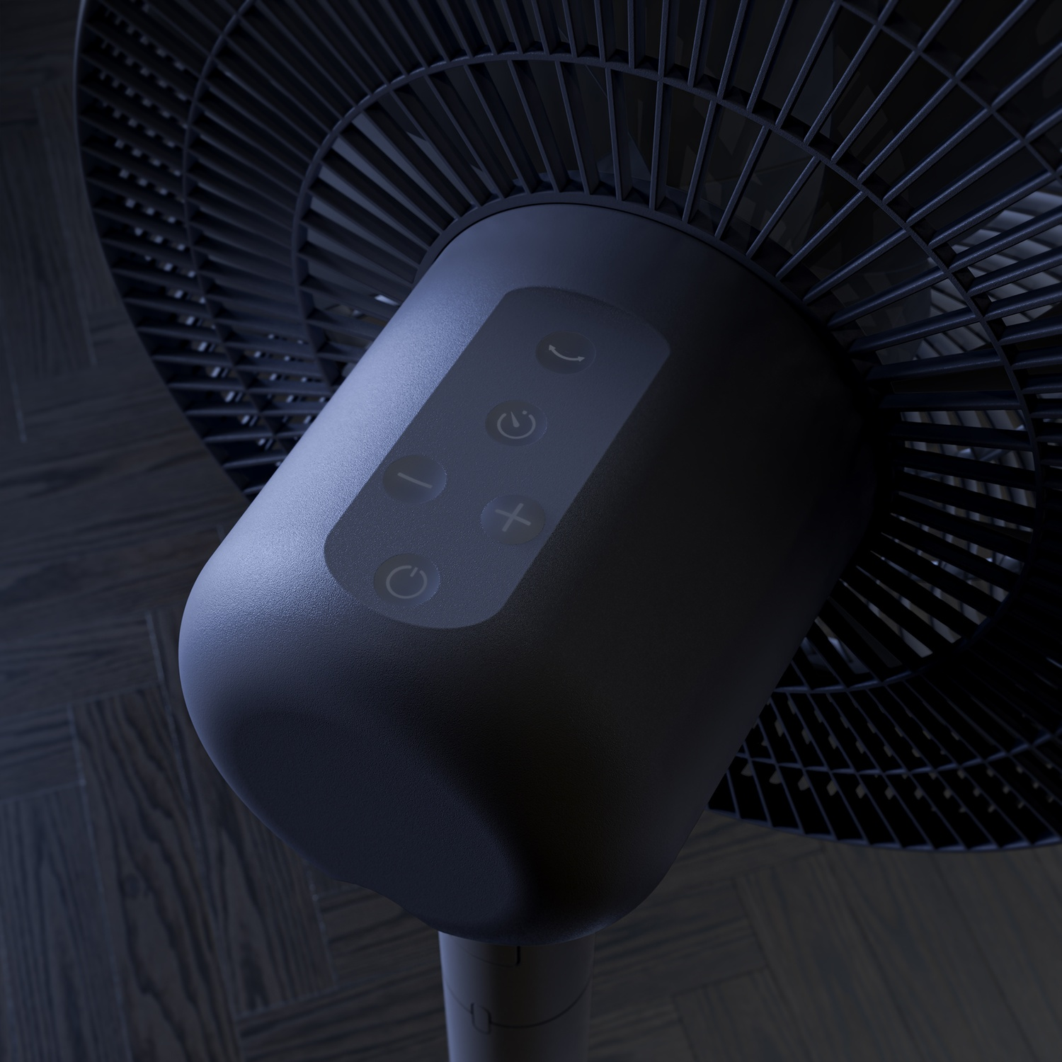 Gros plan d'un ventilateur noir avec panneau de commande sur un plancher en bois.