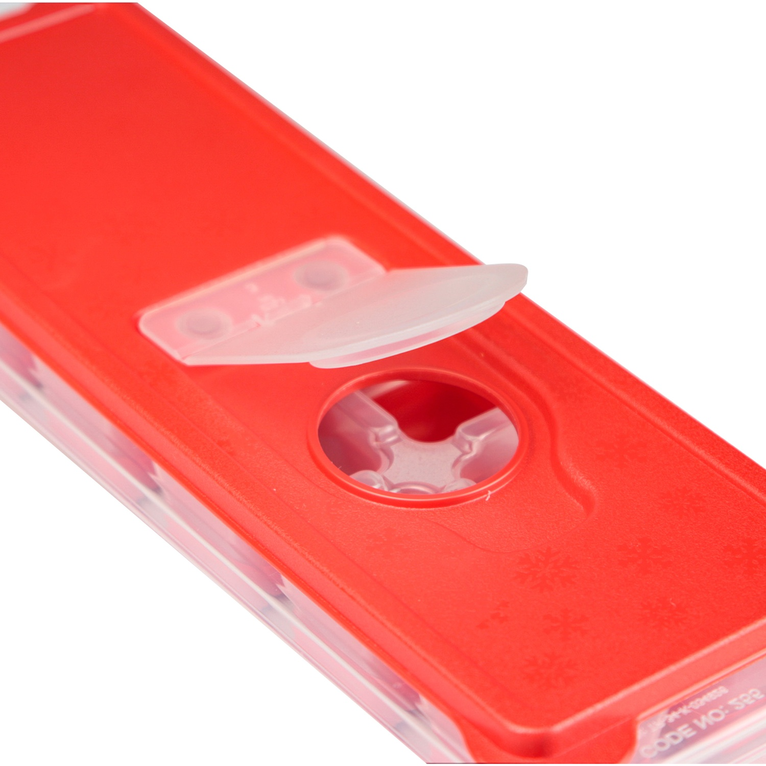 Boîte de rangement rouge avec couvercle transparent et motif flocon de neige.