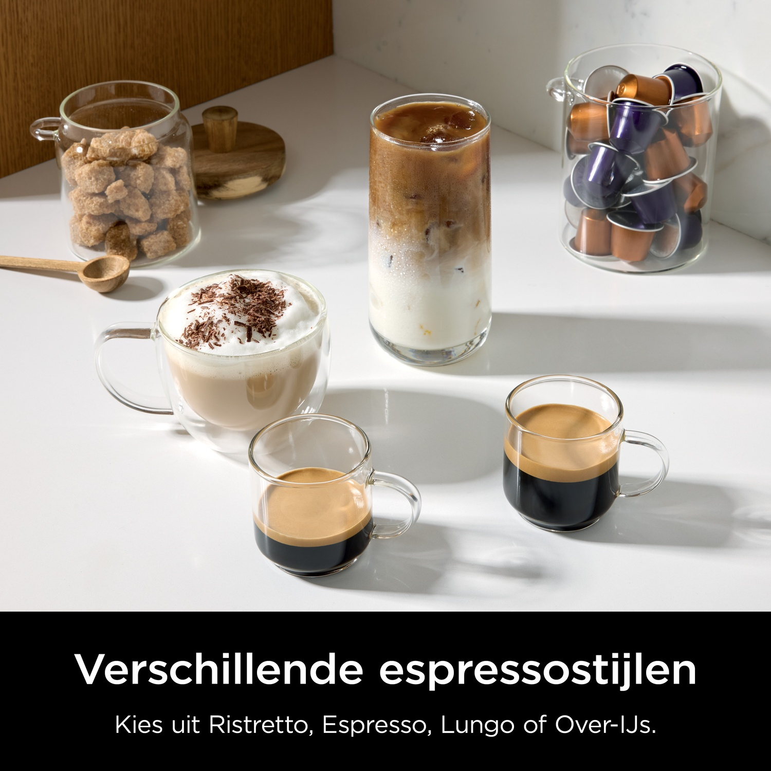 Various coffee styles: latte, espresso, iced coffee, and coffee capsules.