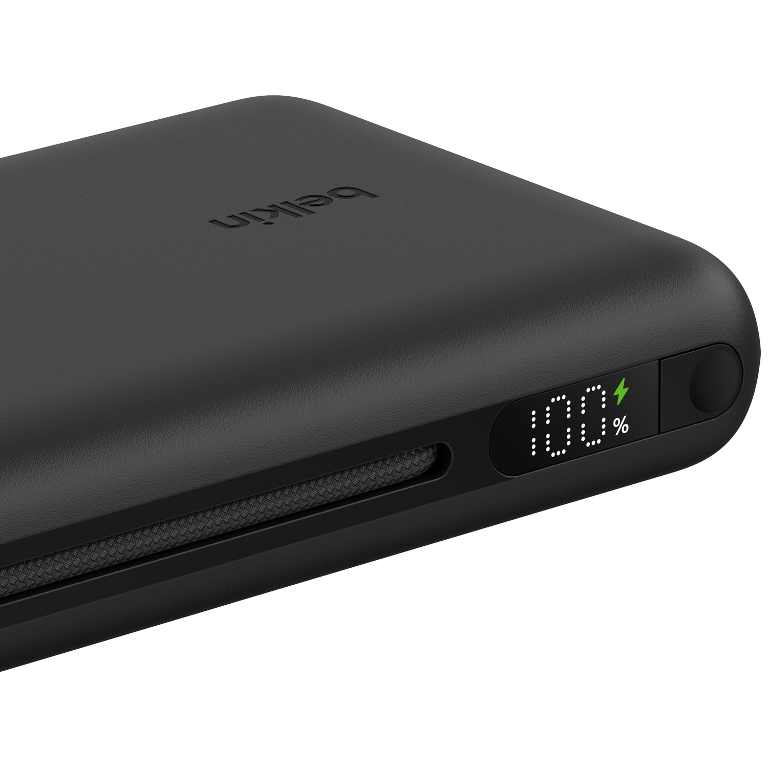 Chargeur noir avec affichage de charge à 100 % et indicateur.