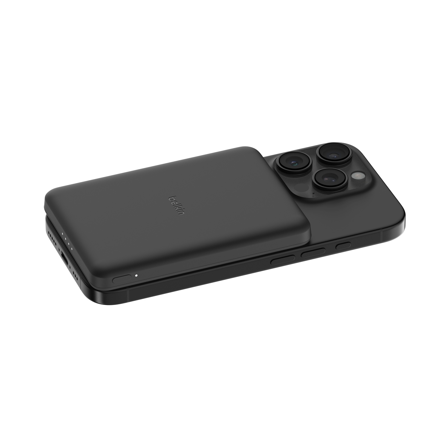 iPhone noir avec une batterie MagSafe noire attachée au dos.