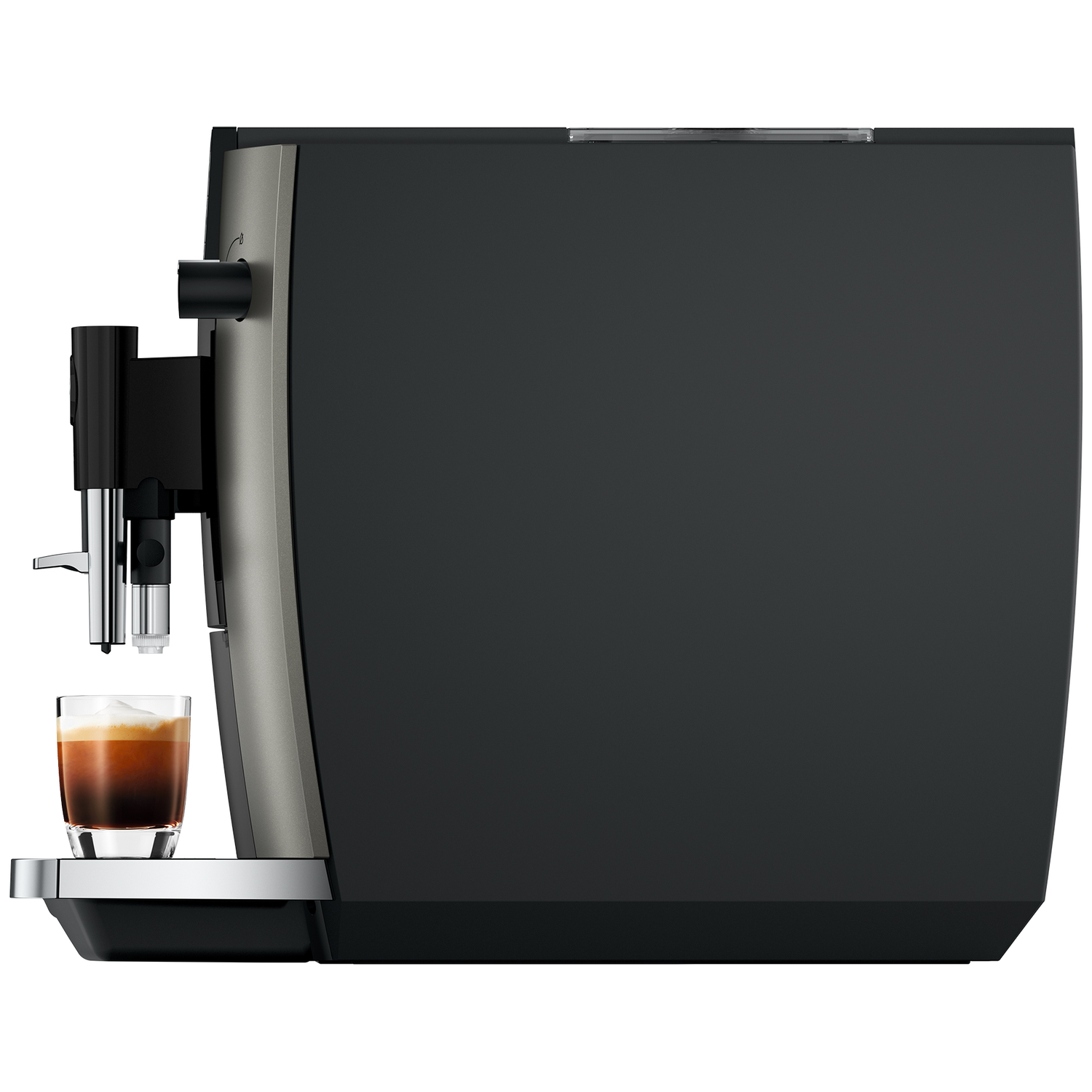 Een koffiezetapparaat met een glas espresso met romig schuim.