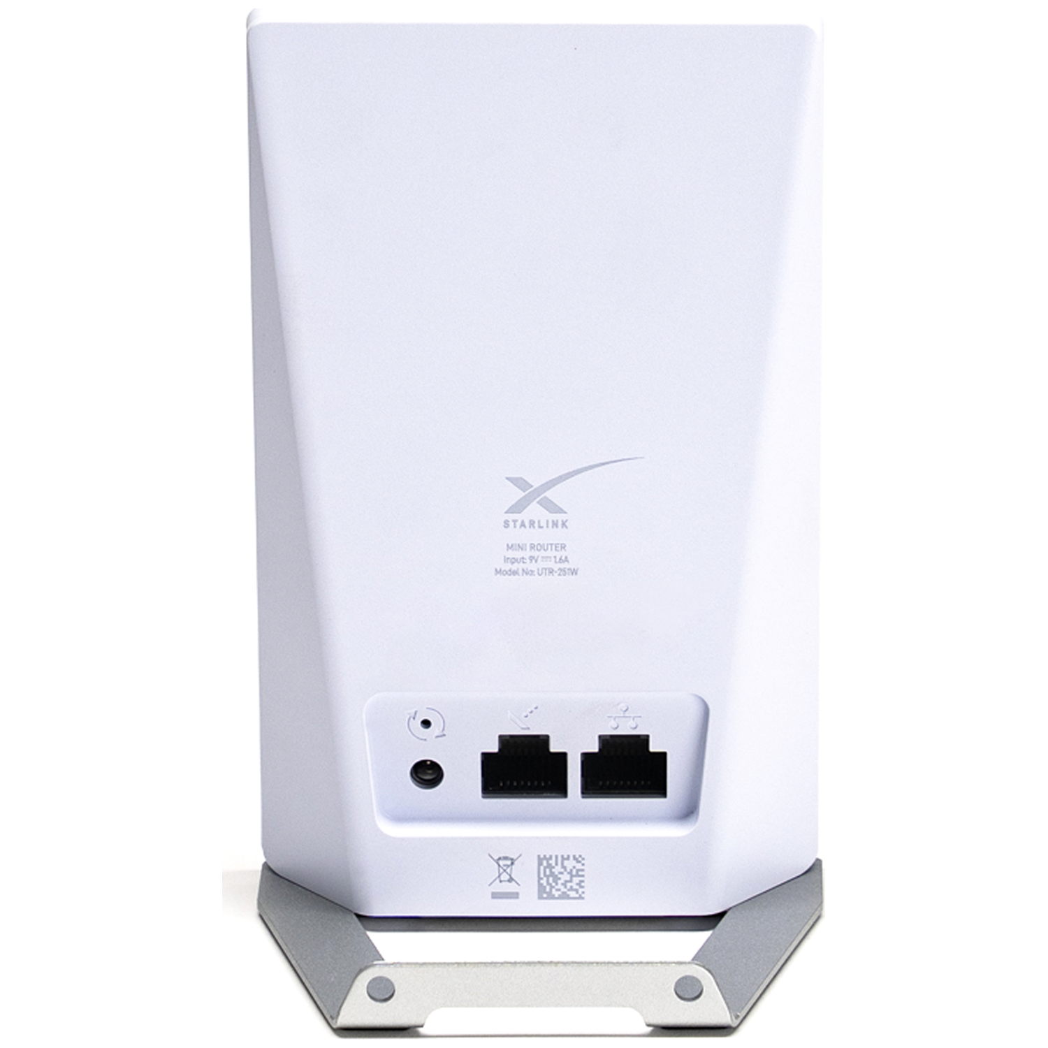 Witte Starlink mini-router met poorten en Starlink-logo op metalen standaard.
