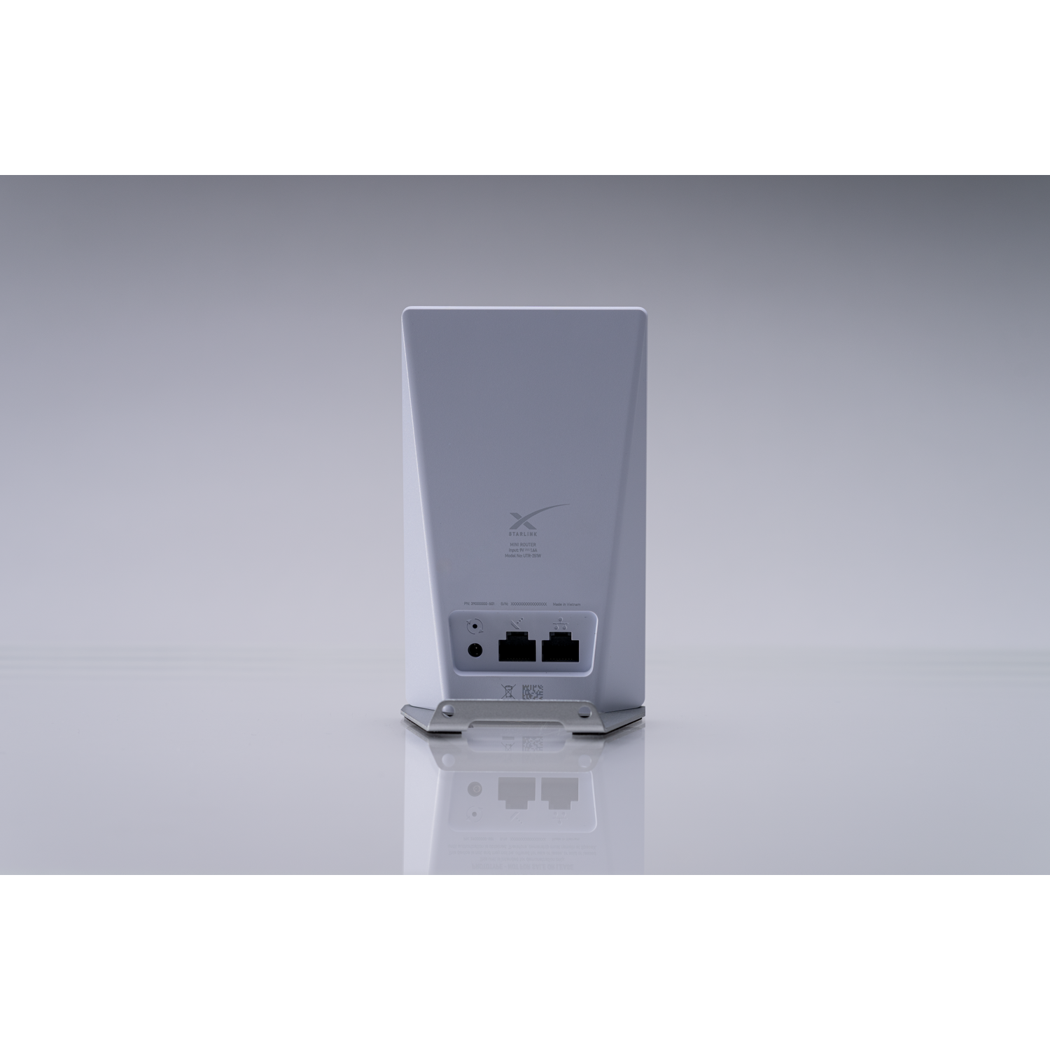 Achterkant van een witte Starlink router met poorten en logo.