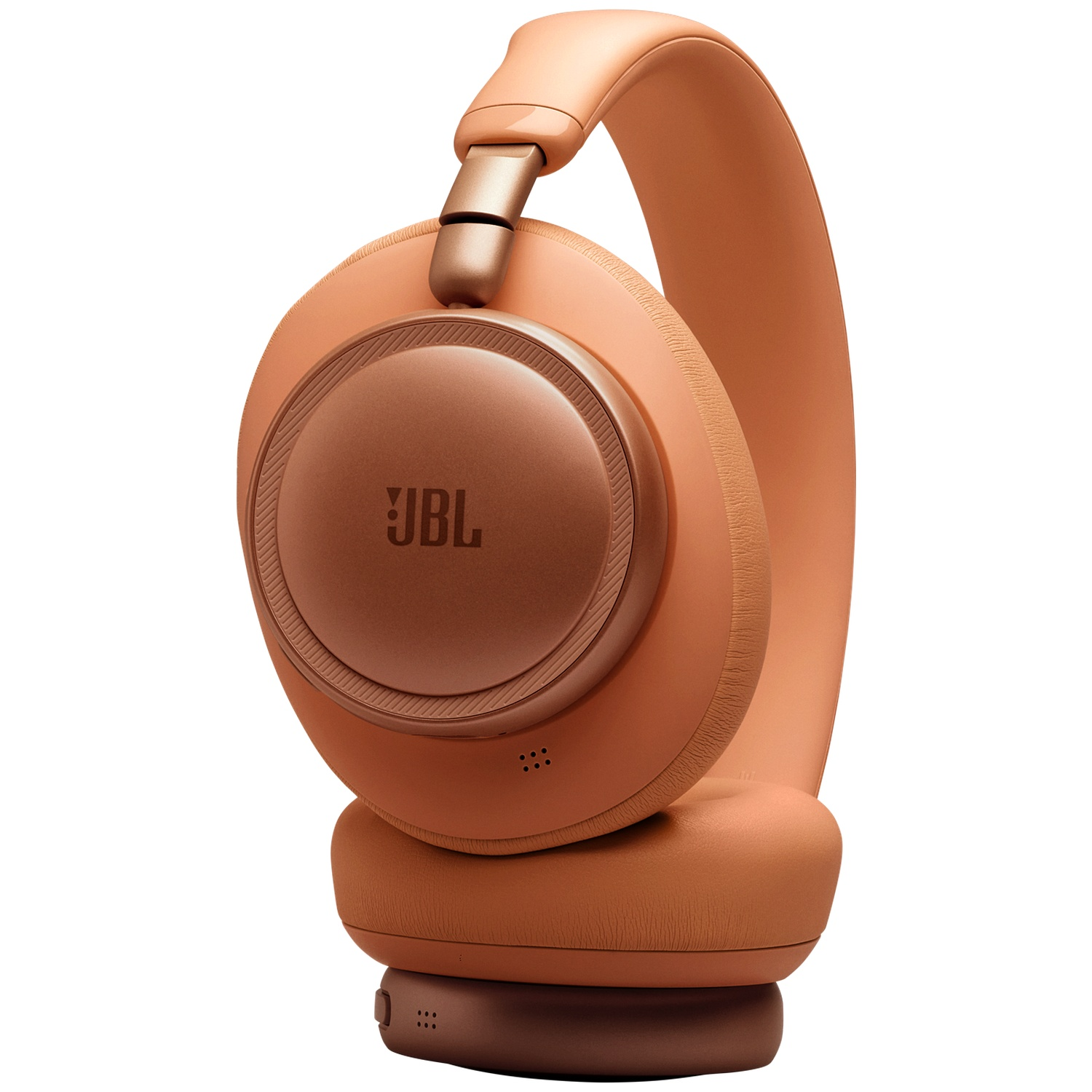Une paire de écouteurs JBL corail avec des accents dorés, isolés sur fond blanc.