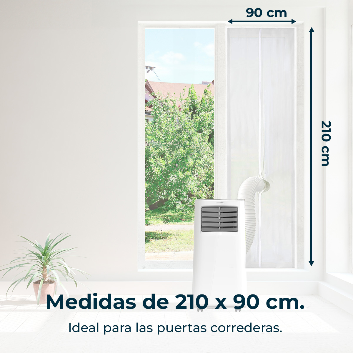 Un aire acondicionado blanco con manguera frente a una ventana de 210x90cm.