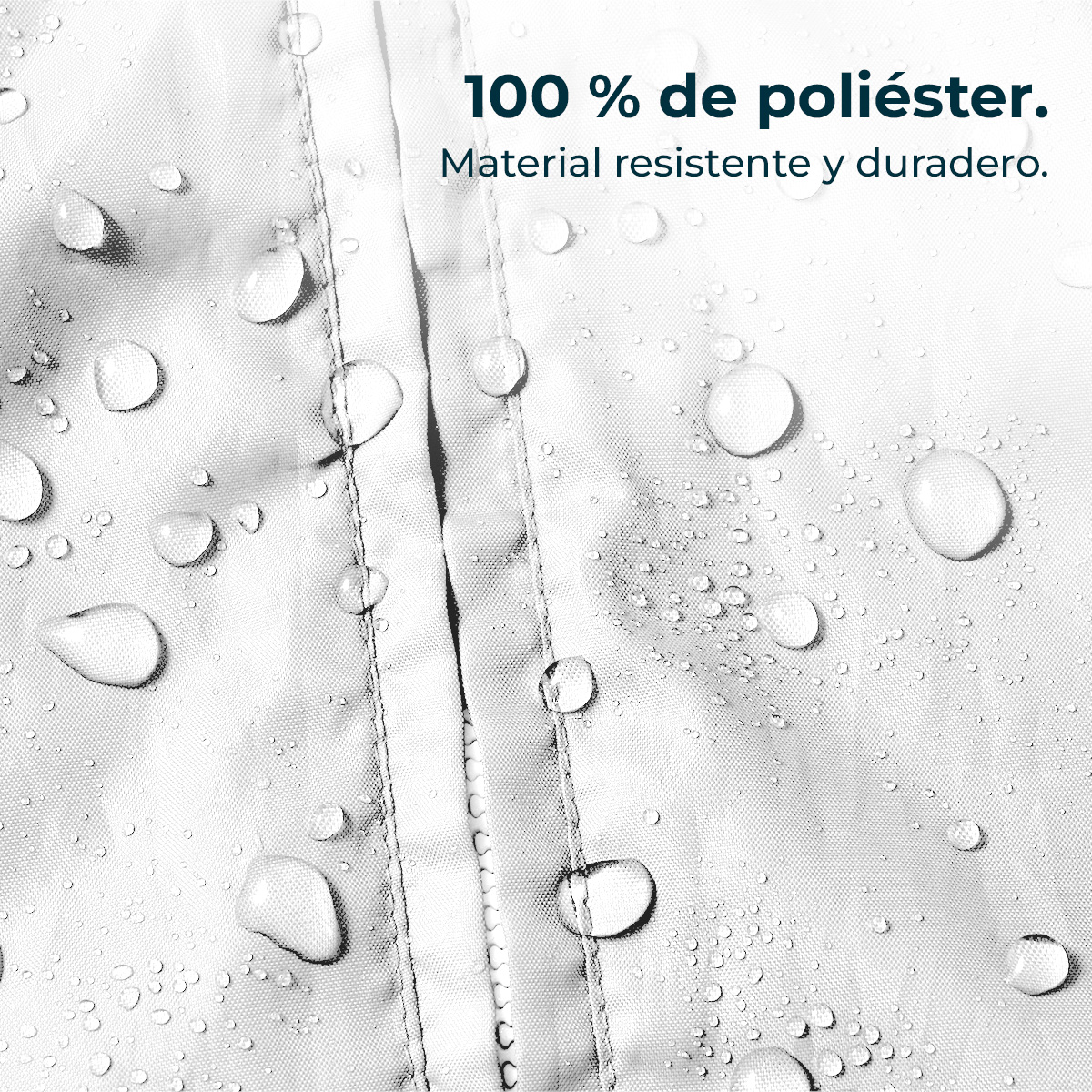 Gotas de agua sobre una superficie de tela blanca recubierta con cremallera.