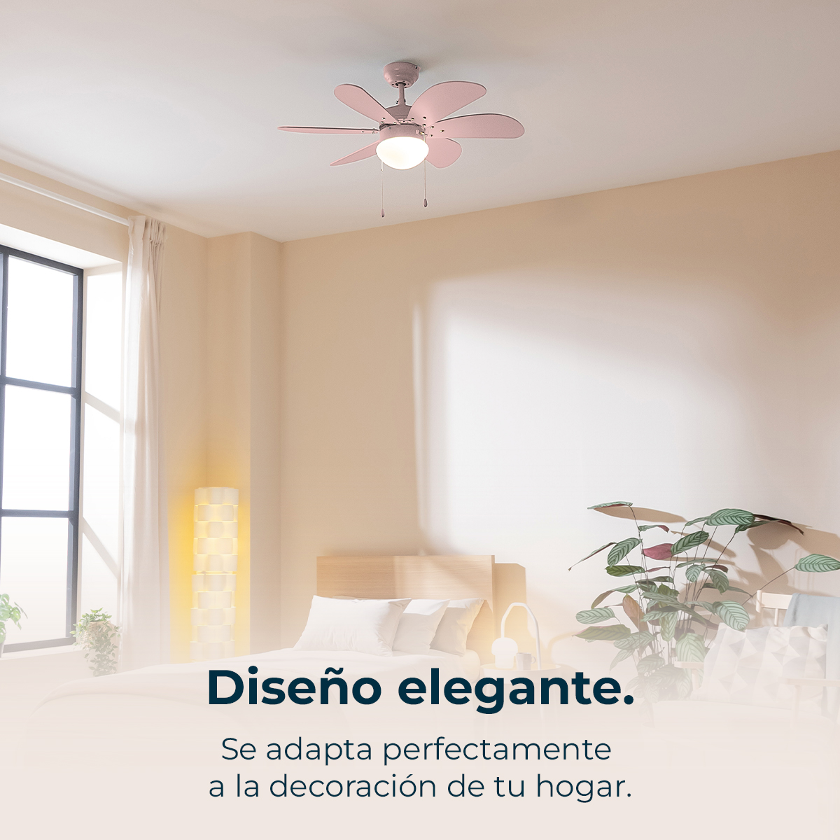 Un ventilador de techo rosa con luz sobre una cama en una habitación luminosa.