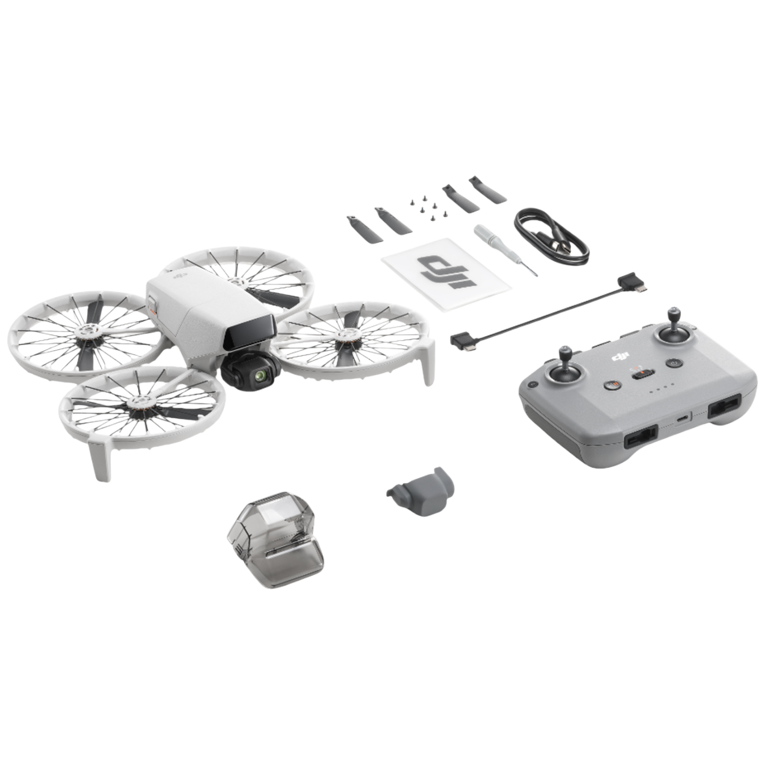 Un kit de mini drone blanc avec hélices, télécommande et accessoires sur fond blanc.