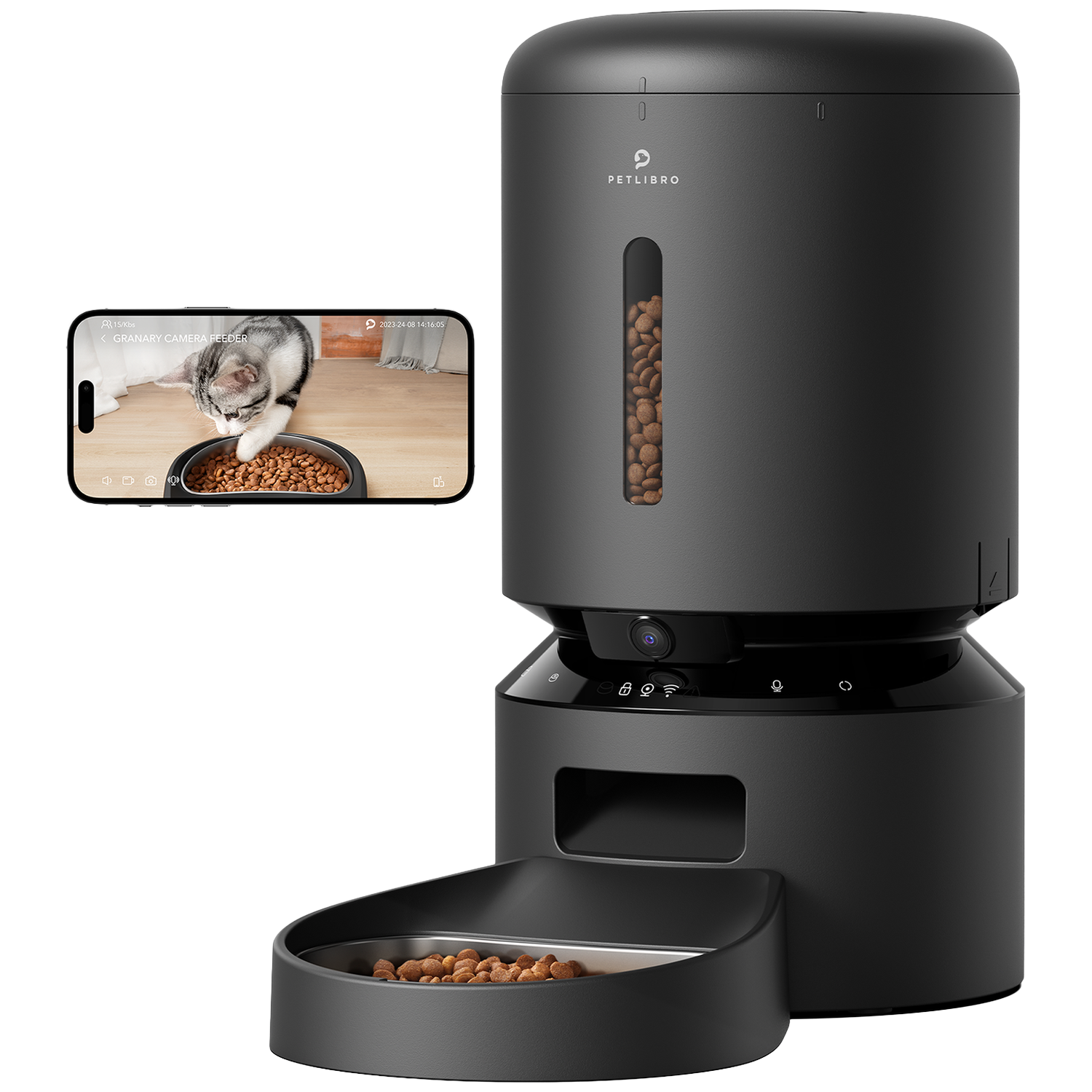 A black automatic pet feeder with camera shows a cat eating. A phone is beside it.