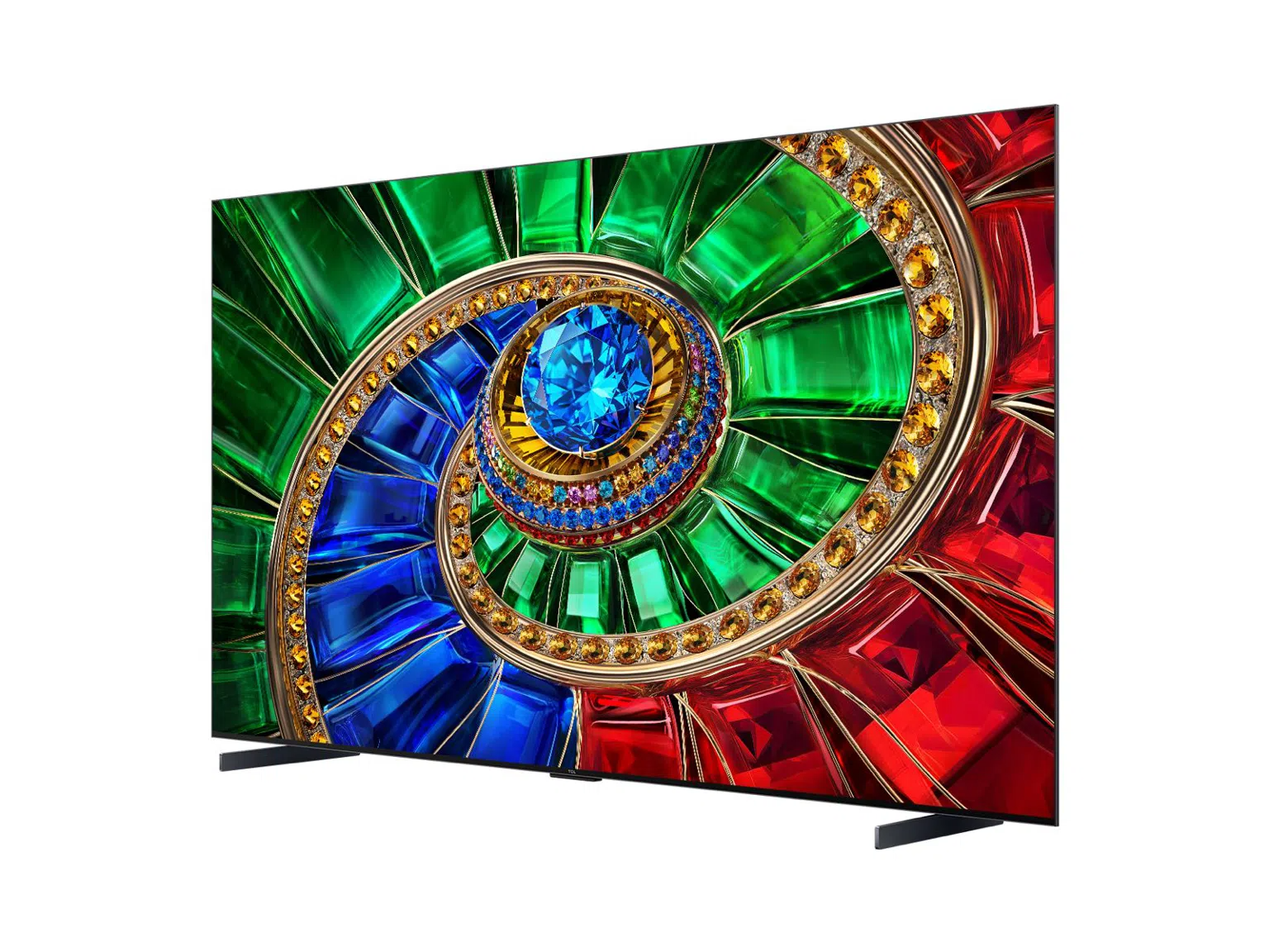 Egy modern televízió, amelynek képernyőjén piros, kék és zöld spirális drágakő motívum látható.