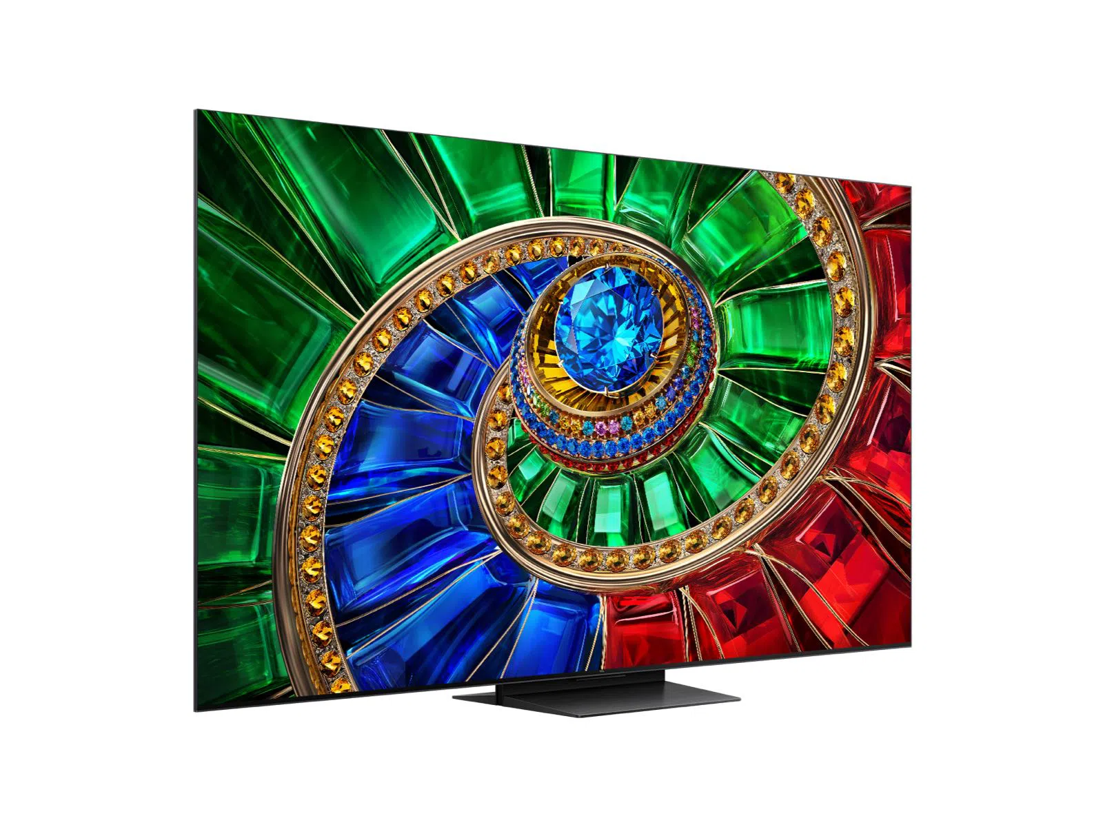 Egy elegáns fekete TV élénk, piros, kék és zöld színű, ékkövekkel díszített spirálmintát jelenít meg.