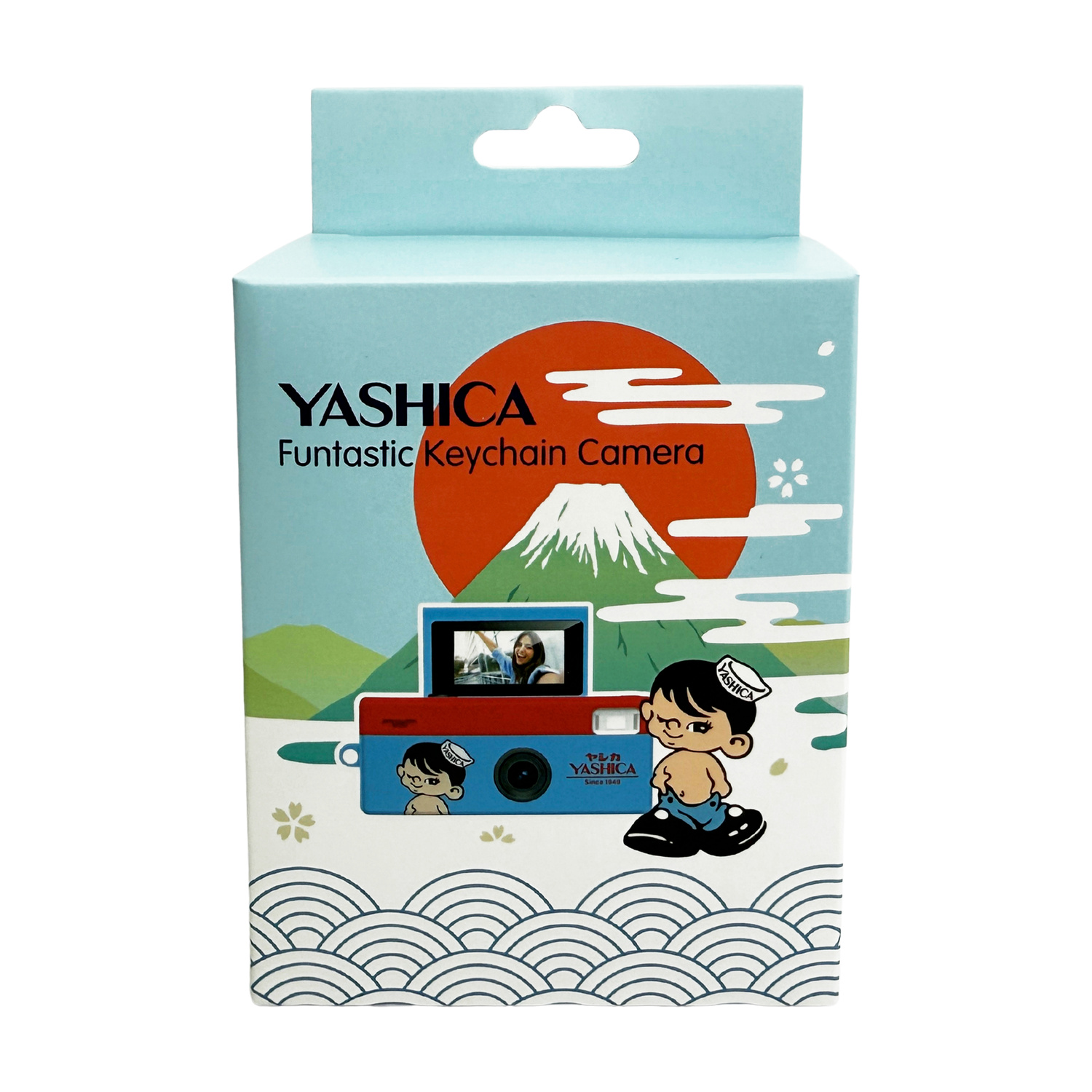 Confezione di una fotocamera portachiavi Yashica Funtastic con Monte Fuji e personaggi.