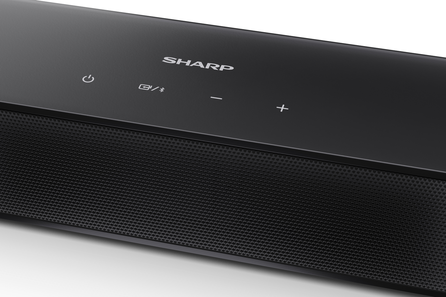 Barra de sonido Sharp negra con frontal de rejilla y botones.