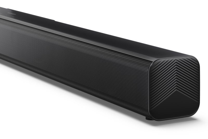 Barra de sonido negra con tapas finales acanaladas sobre fondo blanco.