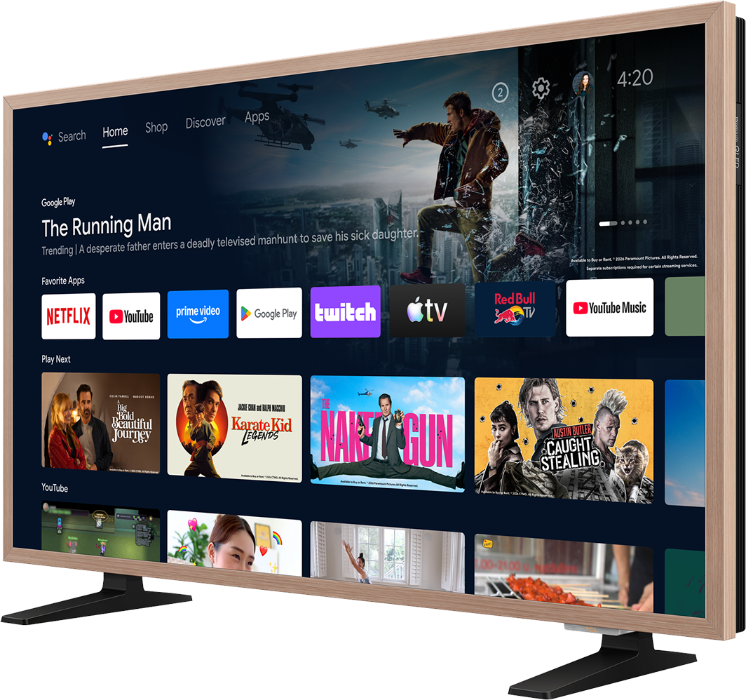 Egy TV-képernyő okos TV felületet mutat alkalmazásokkal és filmplakátokkal.