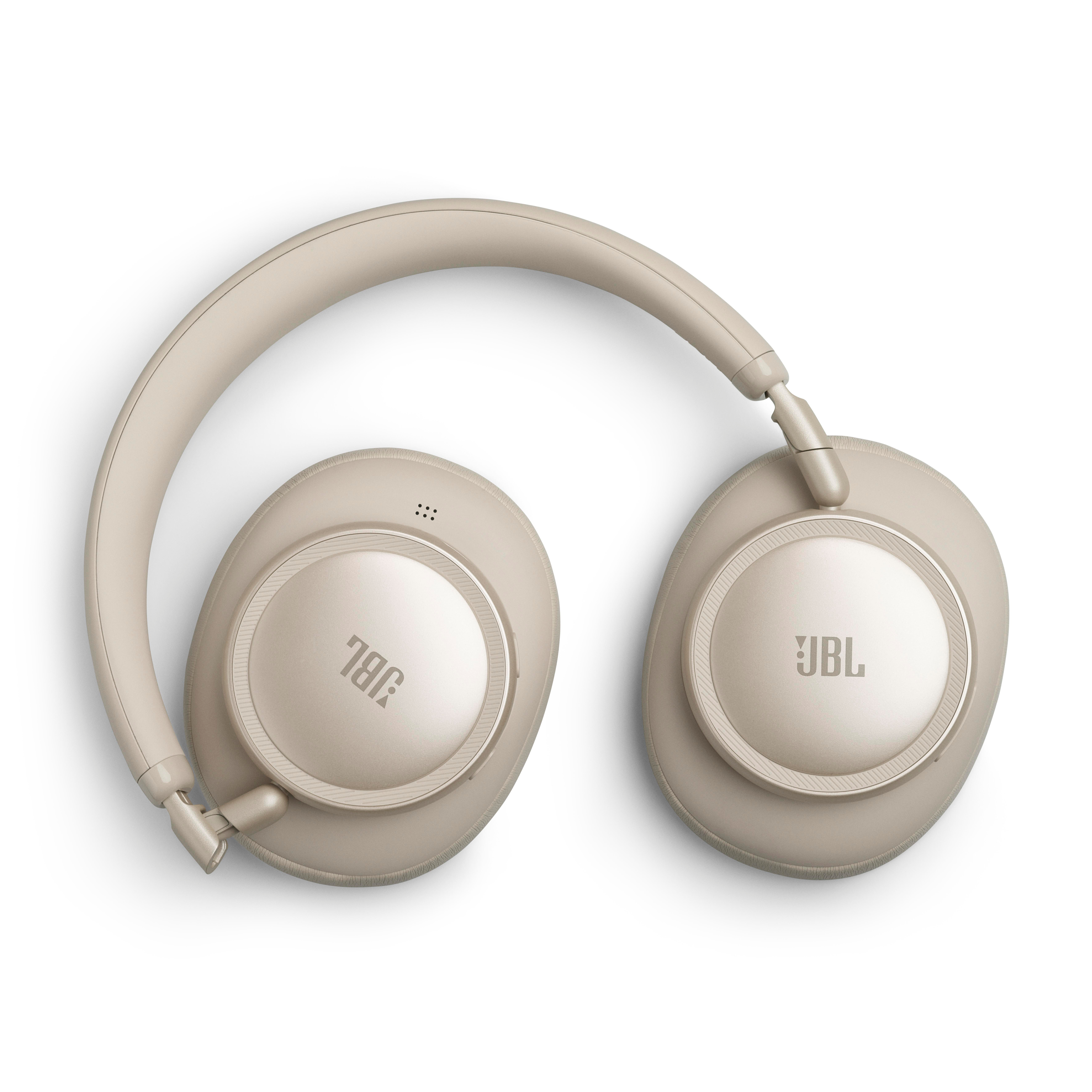 Beige JBL Kopfhörer mit Ohrpolstern und Kopfbügel, auf weißem Hintergrund.