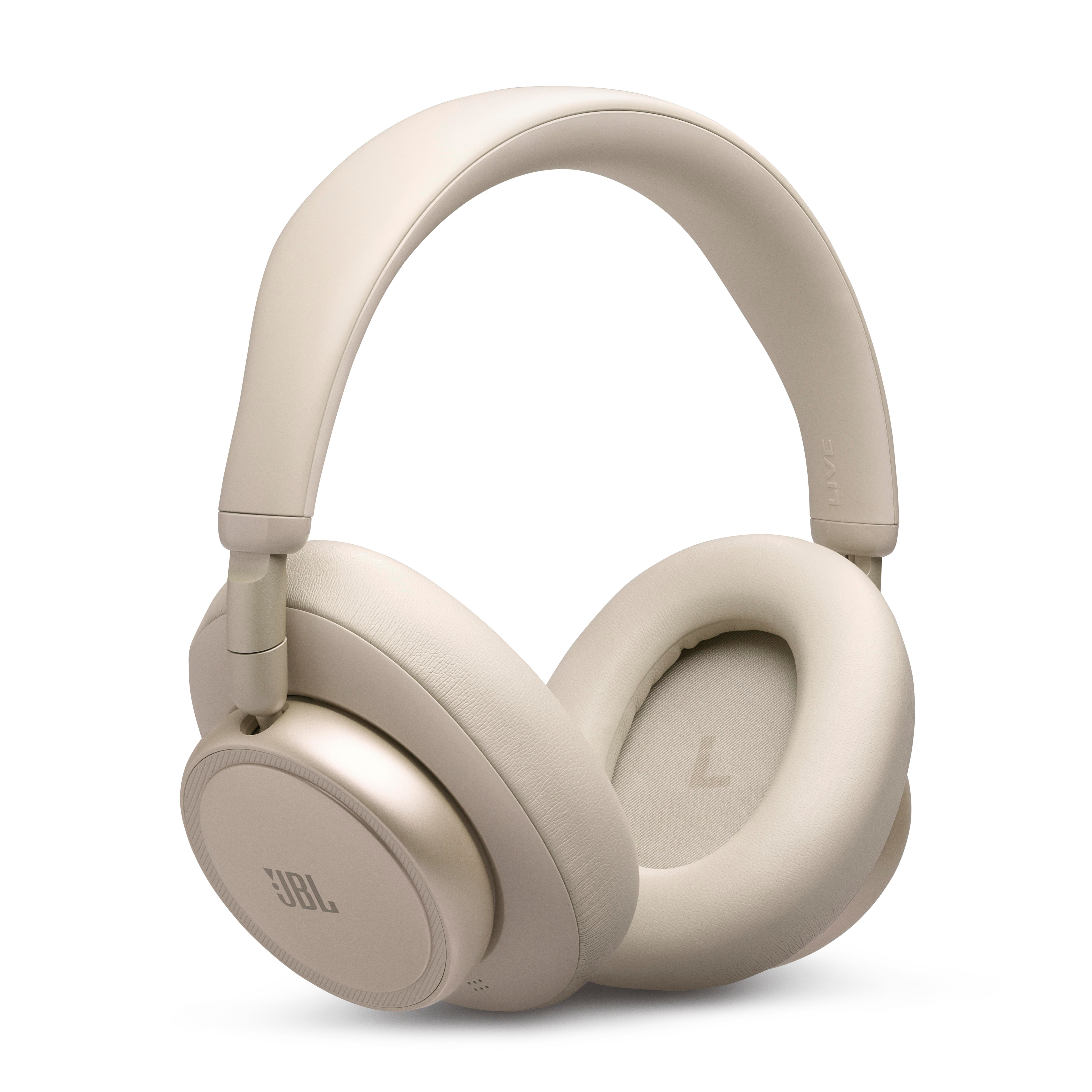Eine beige JBL-Kopfhörer mit gepolsterten Ohrmuscheln und einem Kopfbügel.
