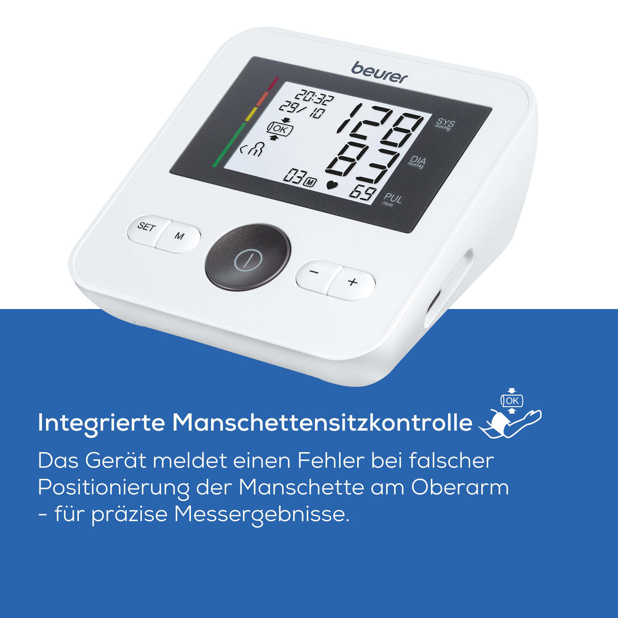Ein weißes Beurer Blutdruckmessgerät mit digitaler Anzeige zeigt Messwerte an.