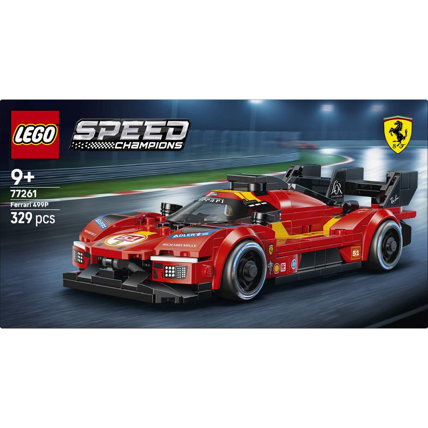 Een rode Lego Ferrari 499P raceauto op een circuit met lichten.