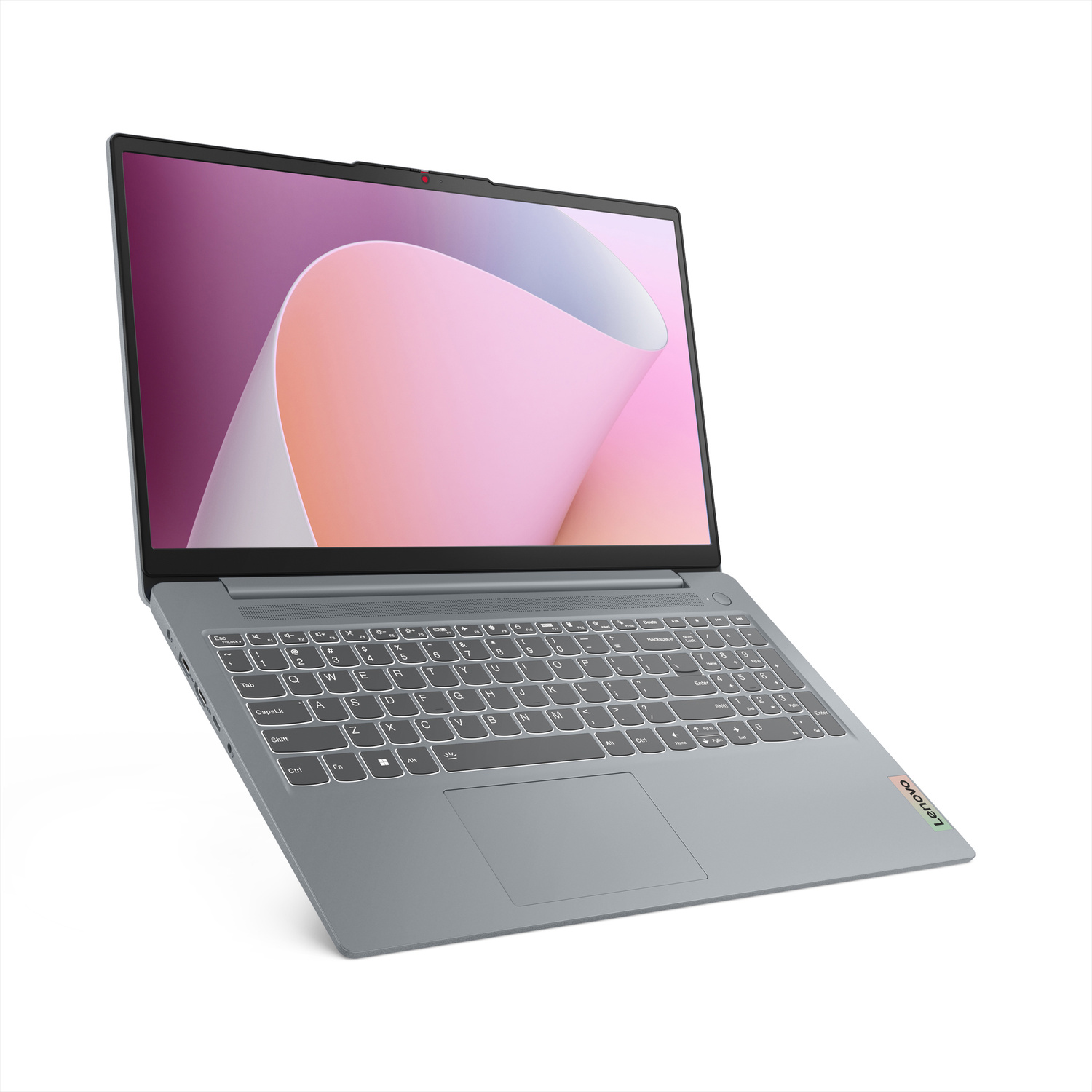 Un laptop Lenovo grigio con tastiera retroilluminata e sfondo astratto sullo schermo.