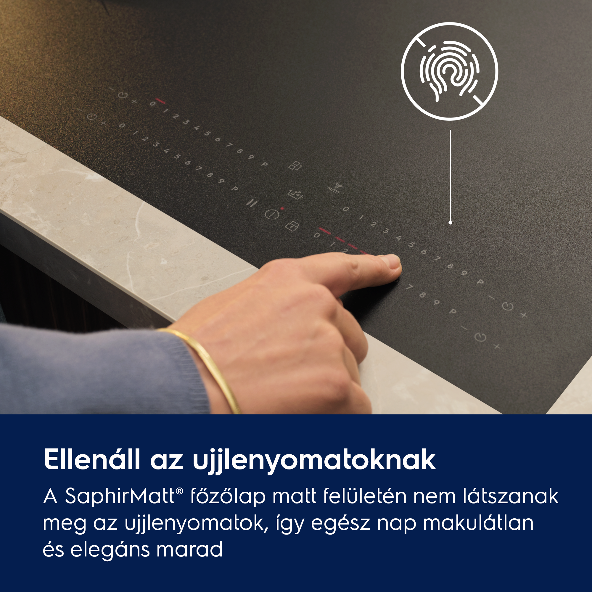 Egy kéz érint meg egy ujjlenyomatos főzőlapot.