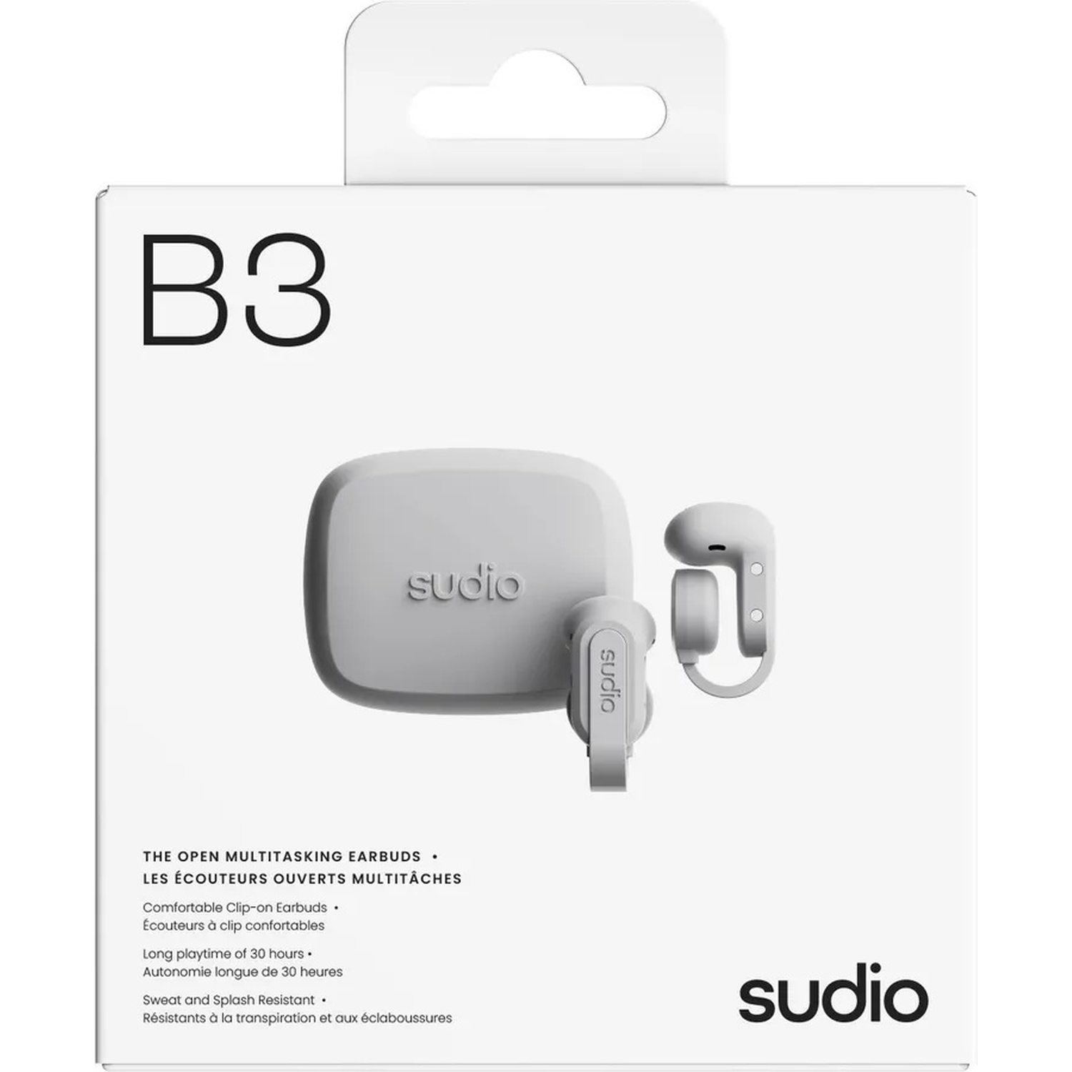 Sudio B3 earbuds packaging with charging case. White box showing product.