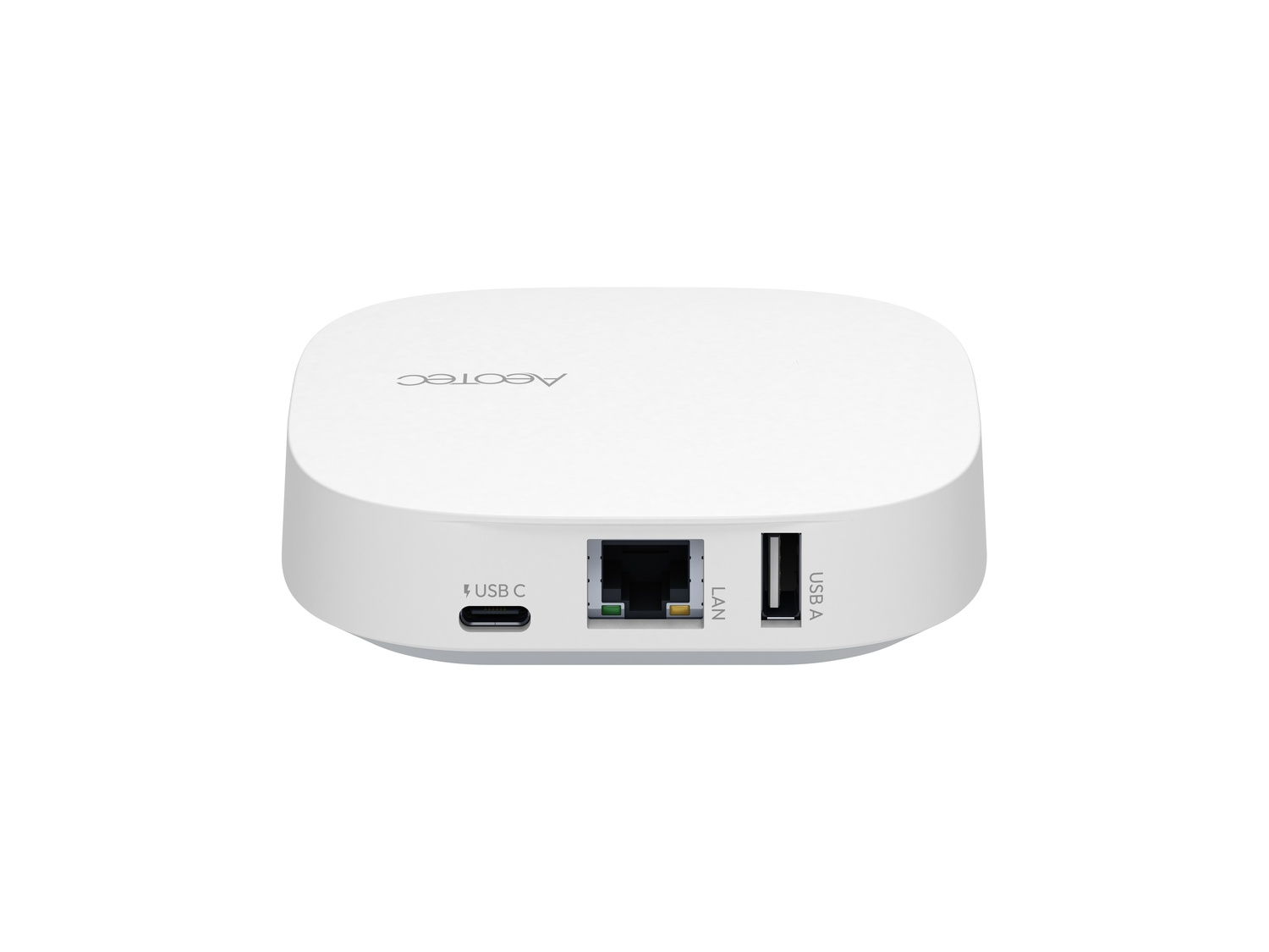 Weißes rechteckiges Gerät mit runden Ecken, mit USB-C, LAN und USB-A Anschlüssen.