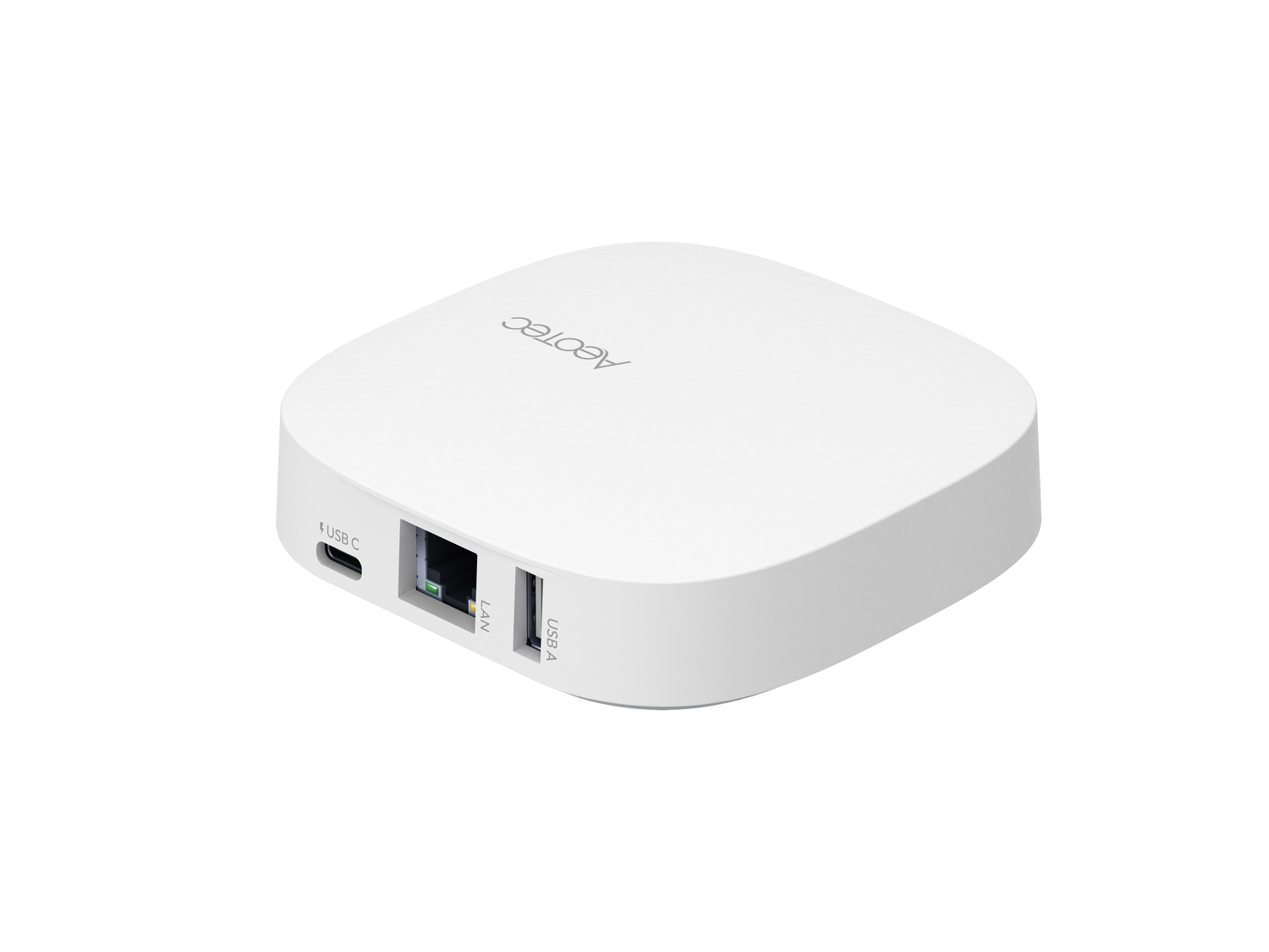 Ein weißes, quadratisches Gerät mit USB-C-, LAN- und USB-A-Anschlüssen.