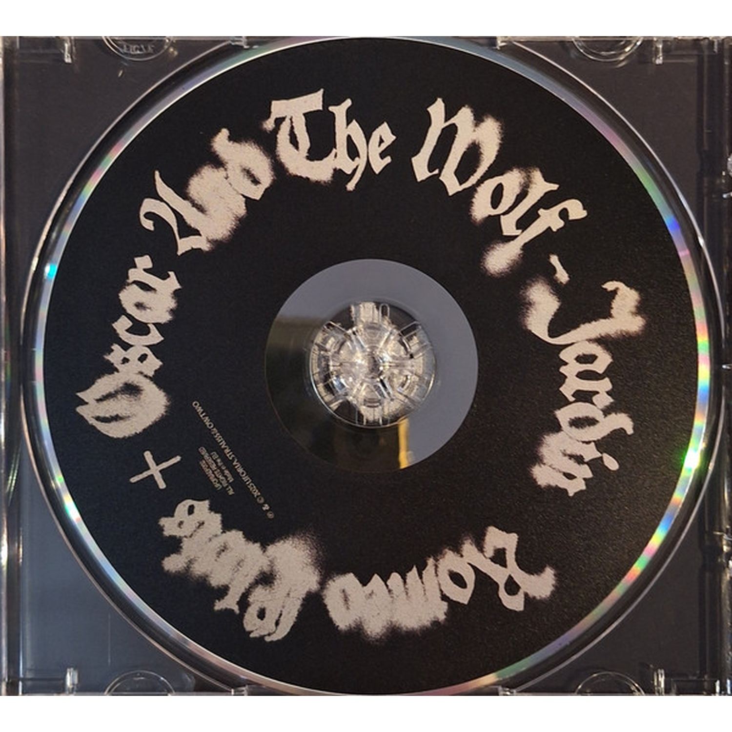 CD met witte tekst: Oscar And The Wolf + Romeo Elvis.