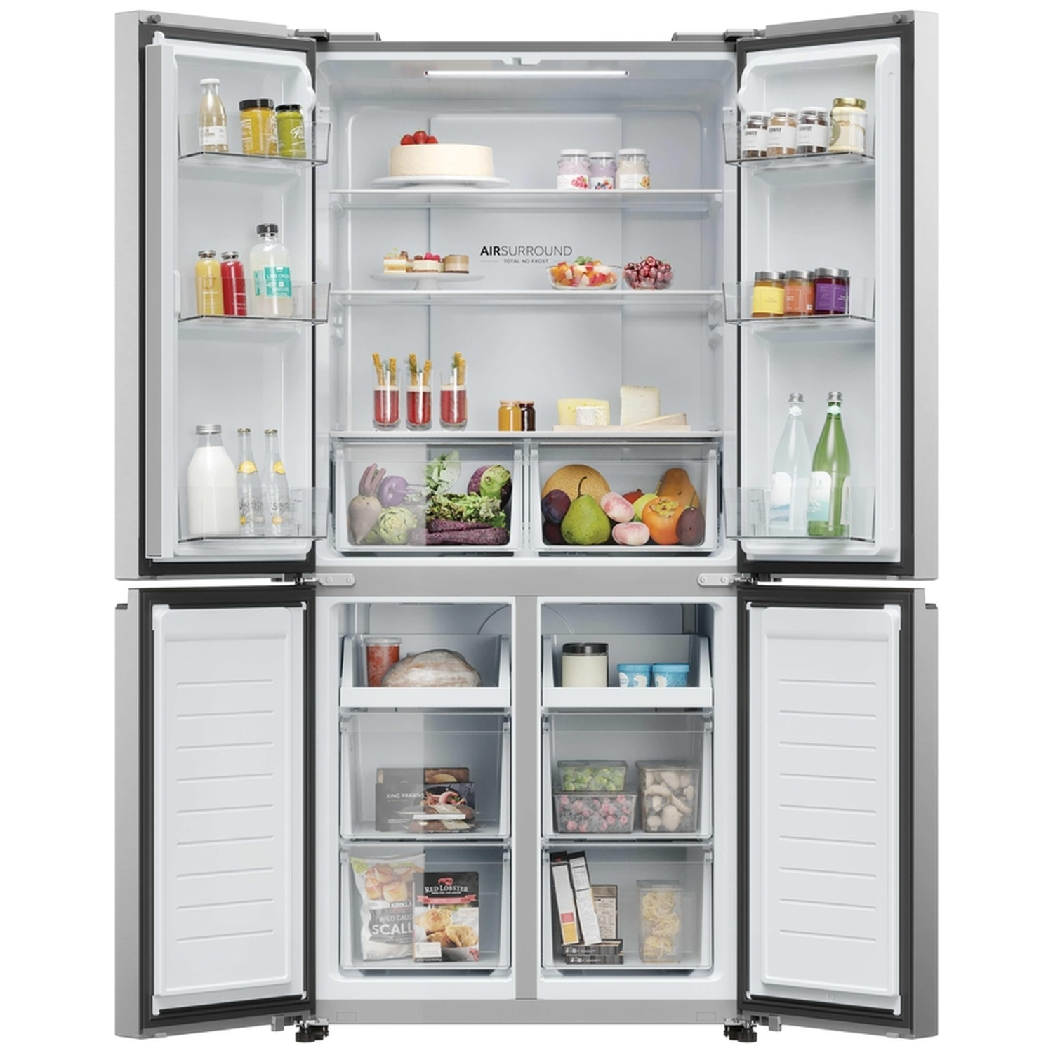 Open refrigerator with food: drinks, fruit, cake, cheese, bread, and frozen items.