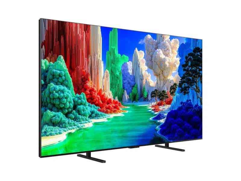 Egy modern TV élénk színű, szürreális tájképet jelenít meg.