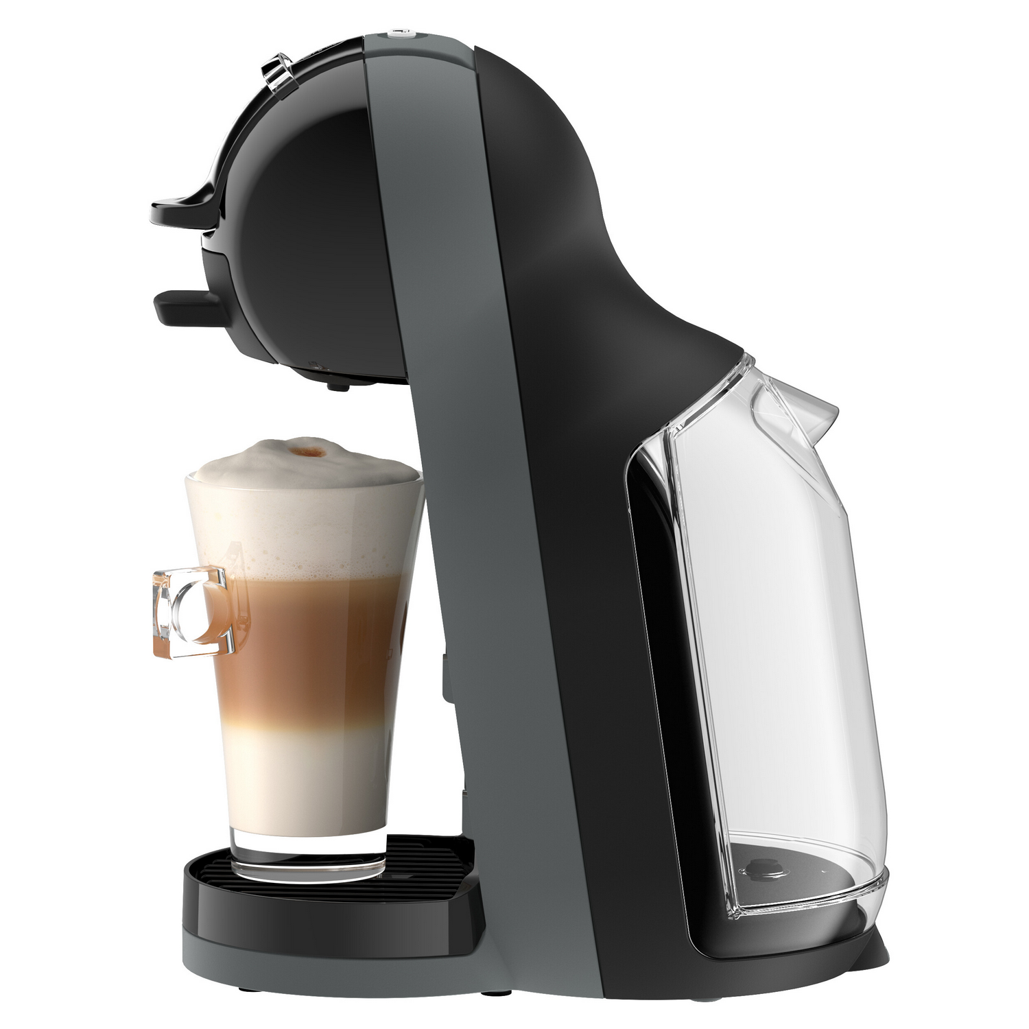 Cafetera negra con un vaso de latte macchiato y espuma de leche.