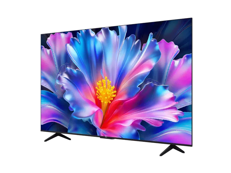 Egy modern televízió egy virág élénk, közeli képét mutatja, kék, rózsaszín és piros szirmokkal.