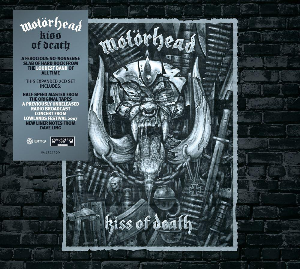 Motörhead Albumcover mit Monster-Logo, Zähnen und Waffen.