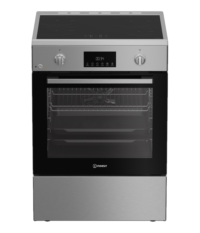 Un moderno forno argento con piano cottura, orologio digitale e porta in vetro.
