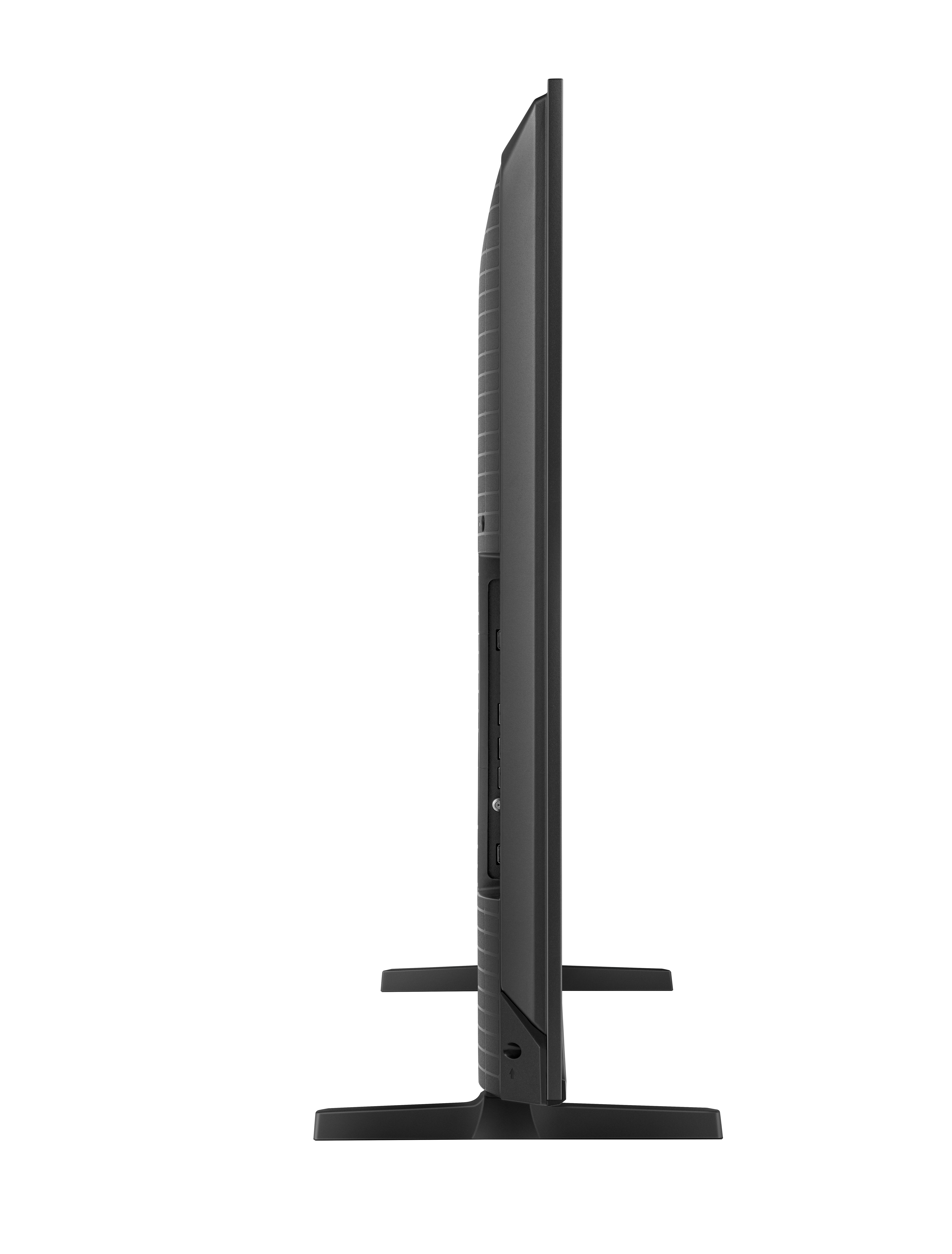 Schwarzer Fernseher im Seitenprofil mit Anschlüssen auf der Rückseite und einem Ständer.