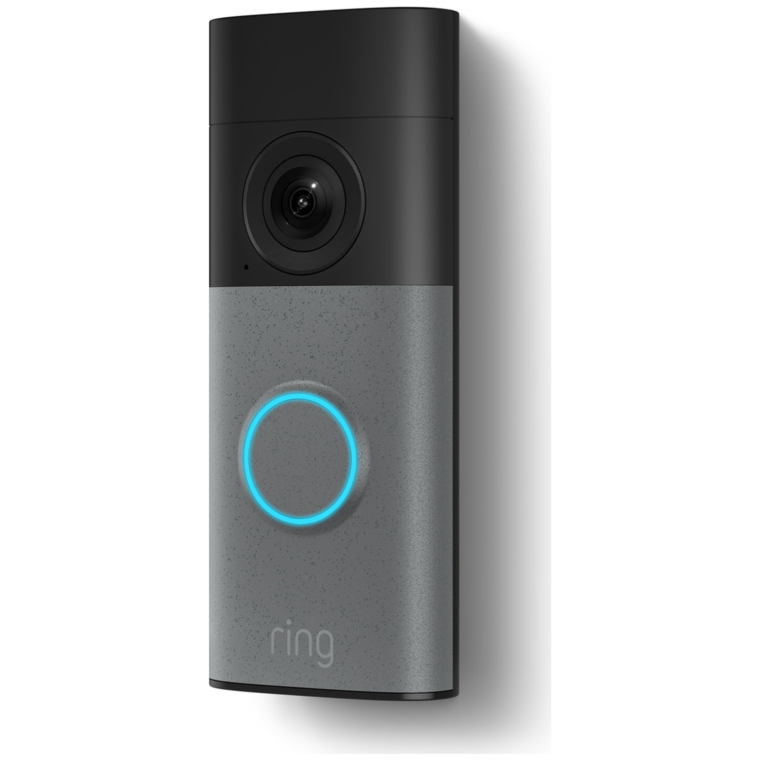 A grey Ring doorbell with a camera and illuminated button, casting a shadow to the right.