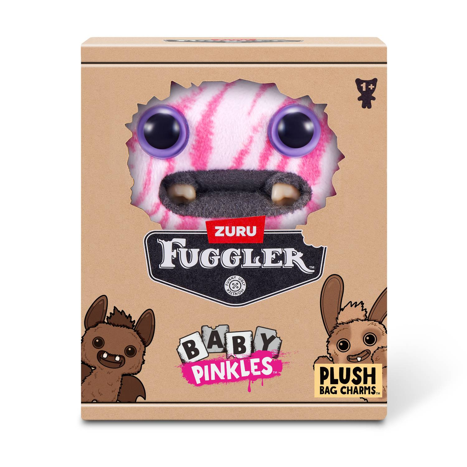 Un juguete Fuggler Baby Pinkles con rayas rosas, ojos morados y dientes afilados en una caja.
