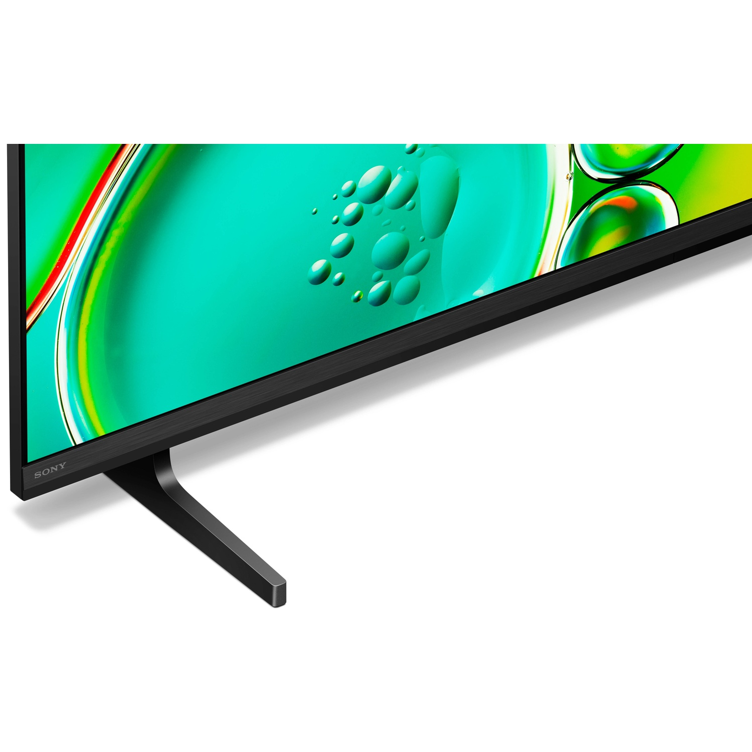 Close-up of a black TV with a Sony logo and an abstract green background with bubbles.