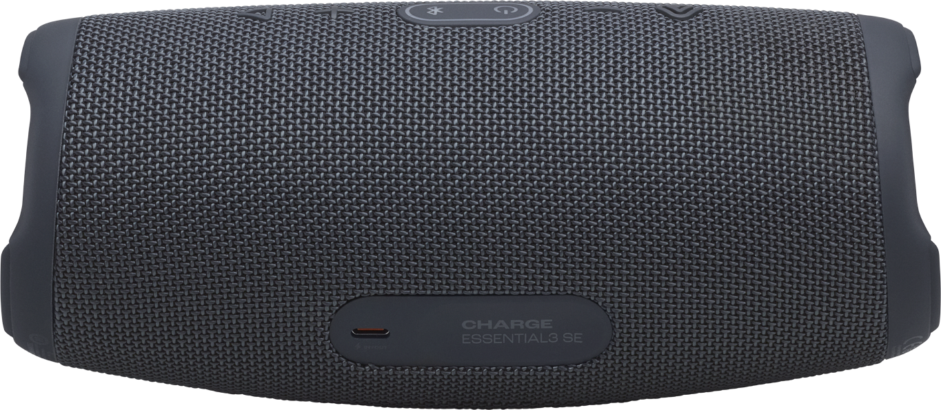 Enceinte Bluetooth grise recouverte de tissu avec commandes dessus.