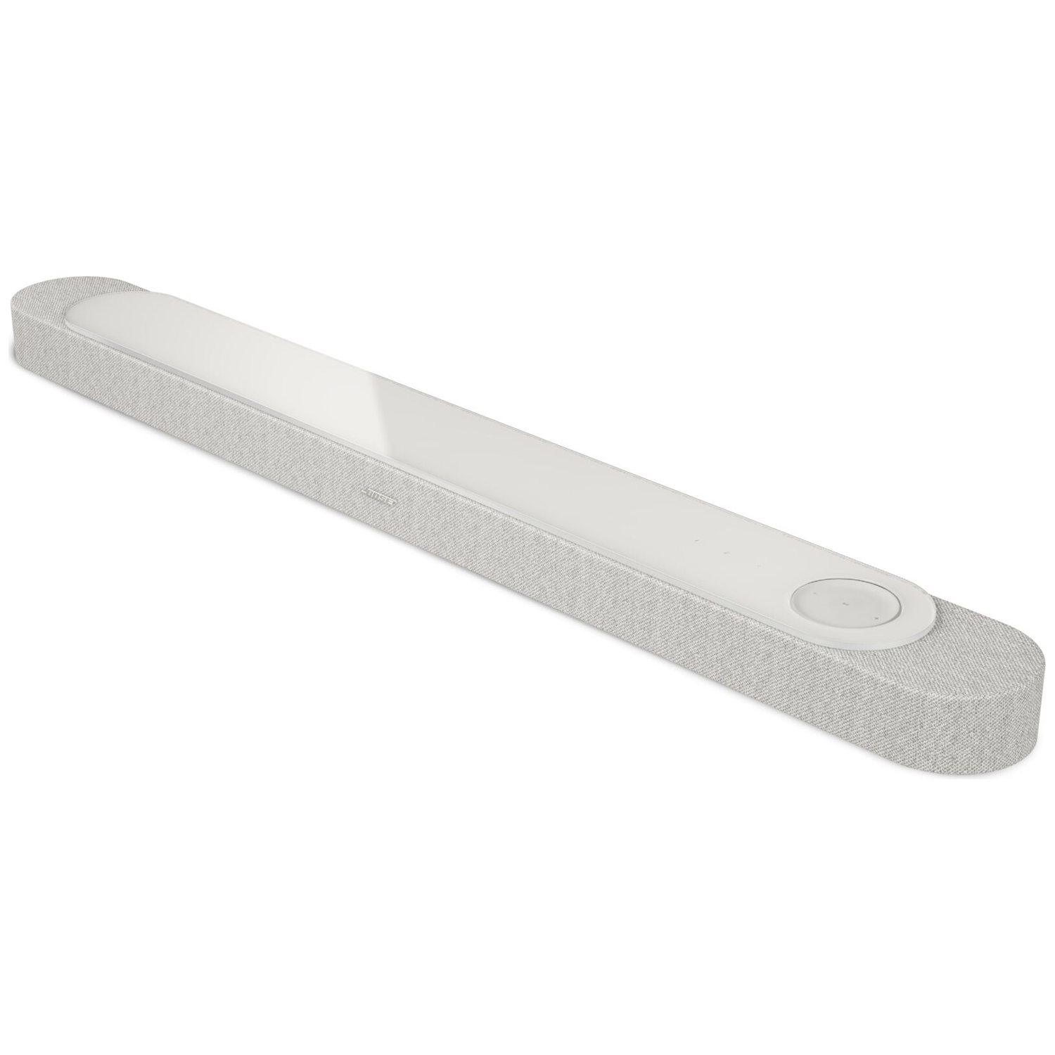 Een lange, slanke, grijze luidspreker met een witte bovenkant en bedieningsknoppen.